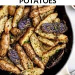 potatoes in a skillet with herbs
