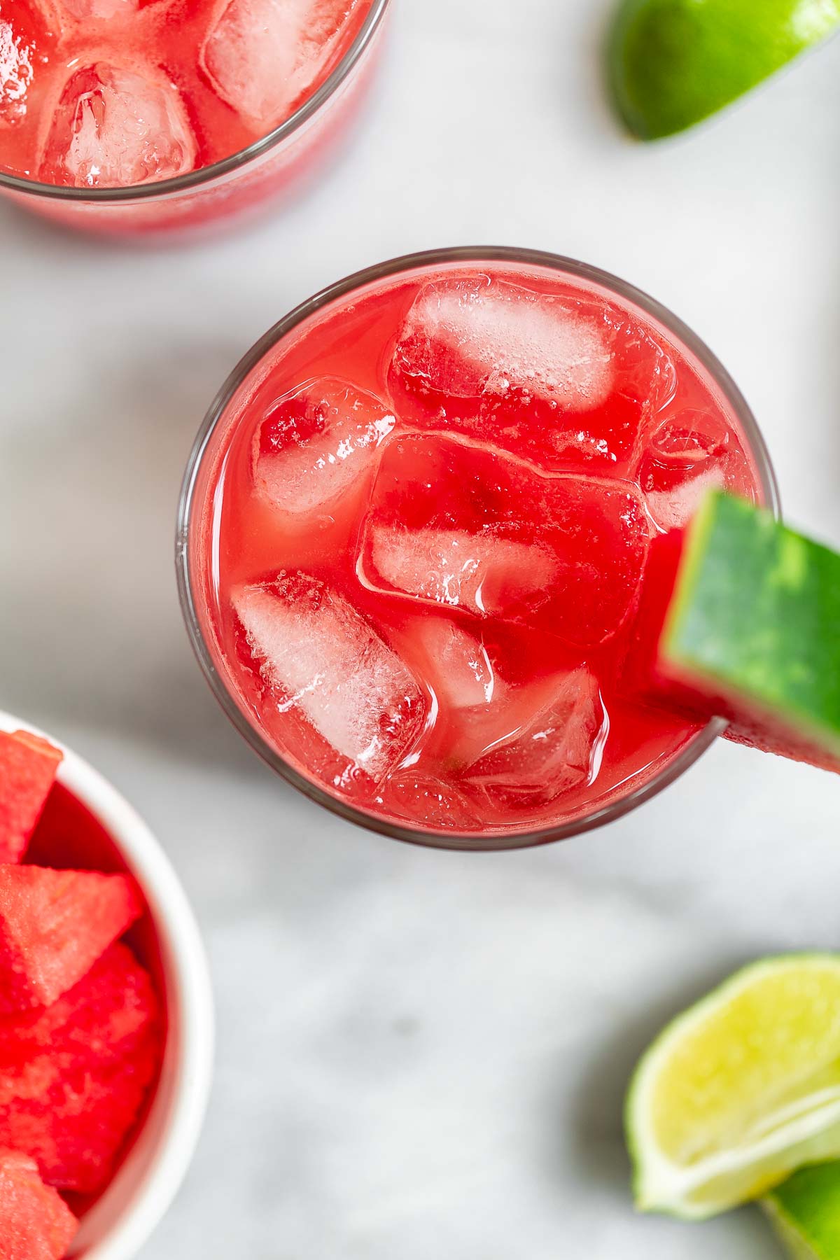 Overhead image of the watermelon cocktail with ice cubes. 