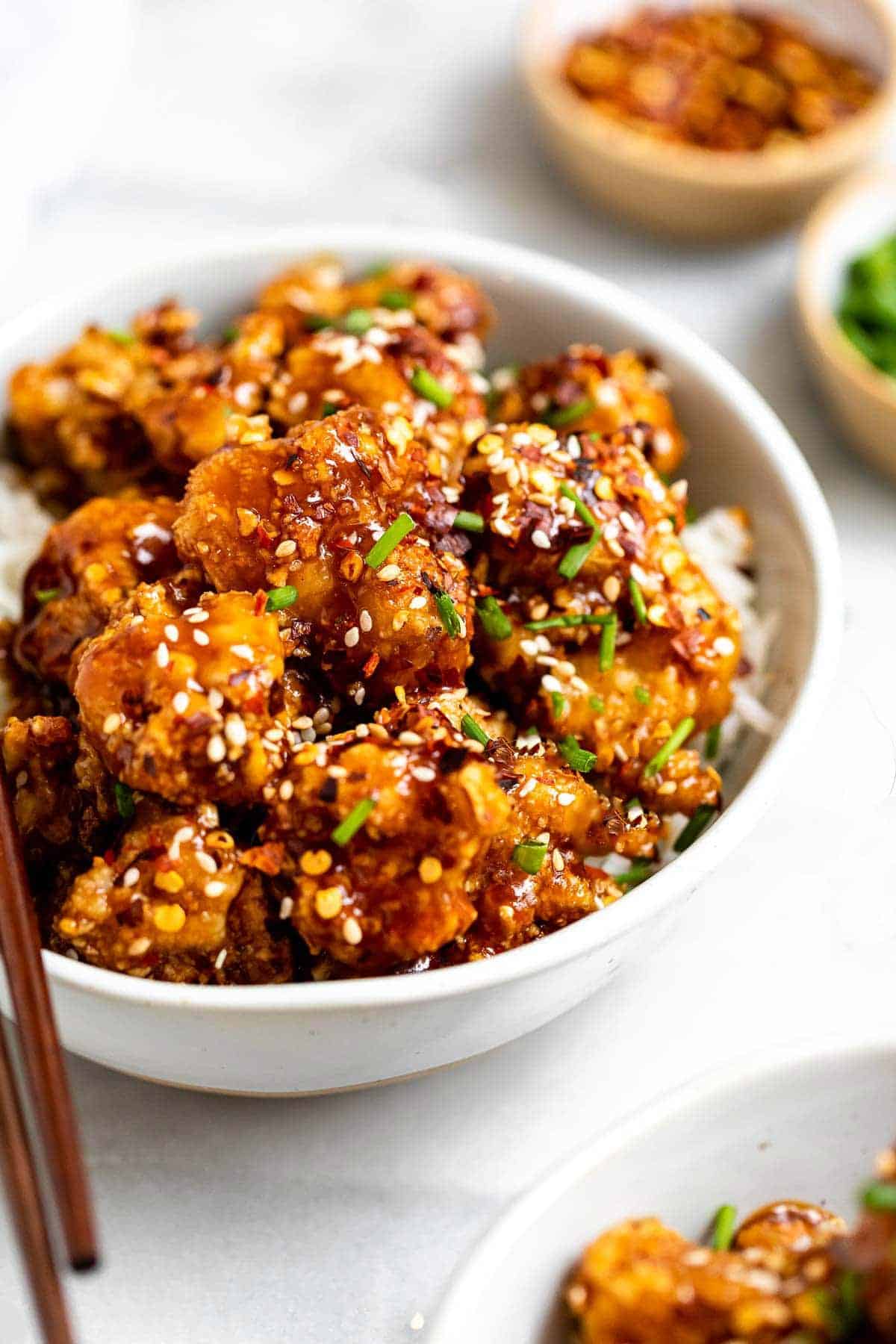 Up close and angled view of the sesame cauliflower to show crispy texture.