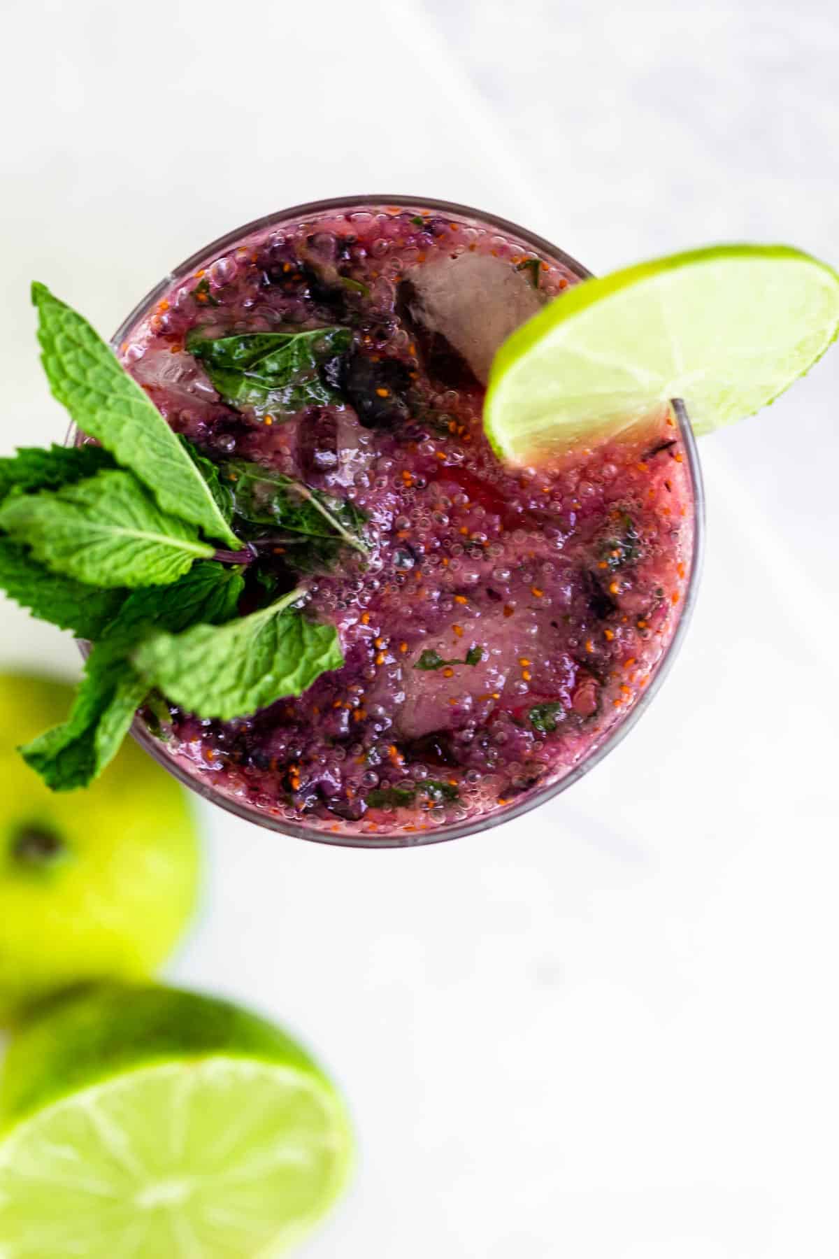 overhead shot of the blueberry mojito with mint leaves