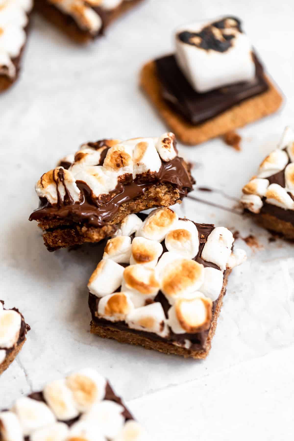 Stack of vegan smores bars to show the melted chocolate.