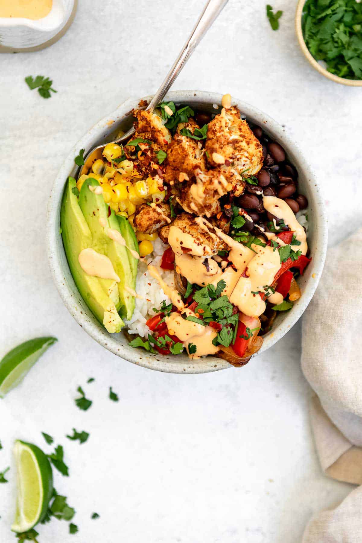Up close image of the final vegetarian burrito bowl with cilantro lime rice. 