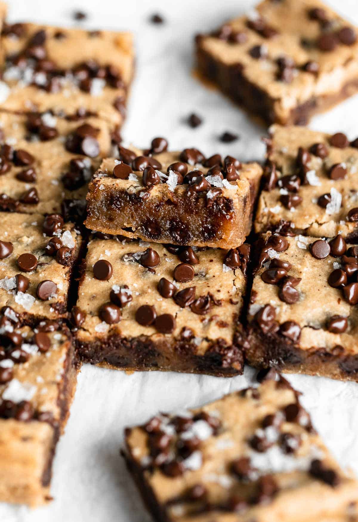 chickpea blondies on the side cut into squares to show gooey texture