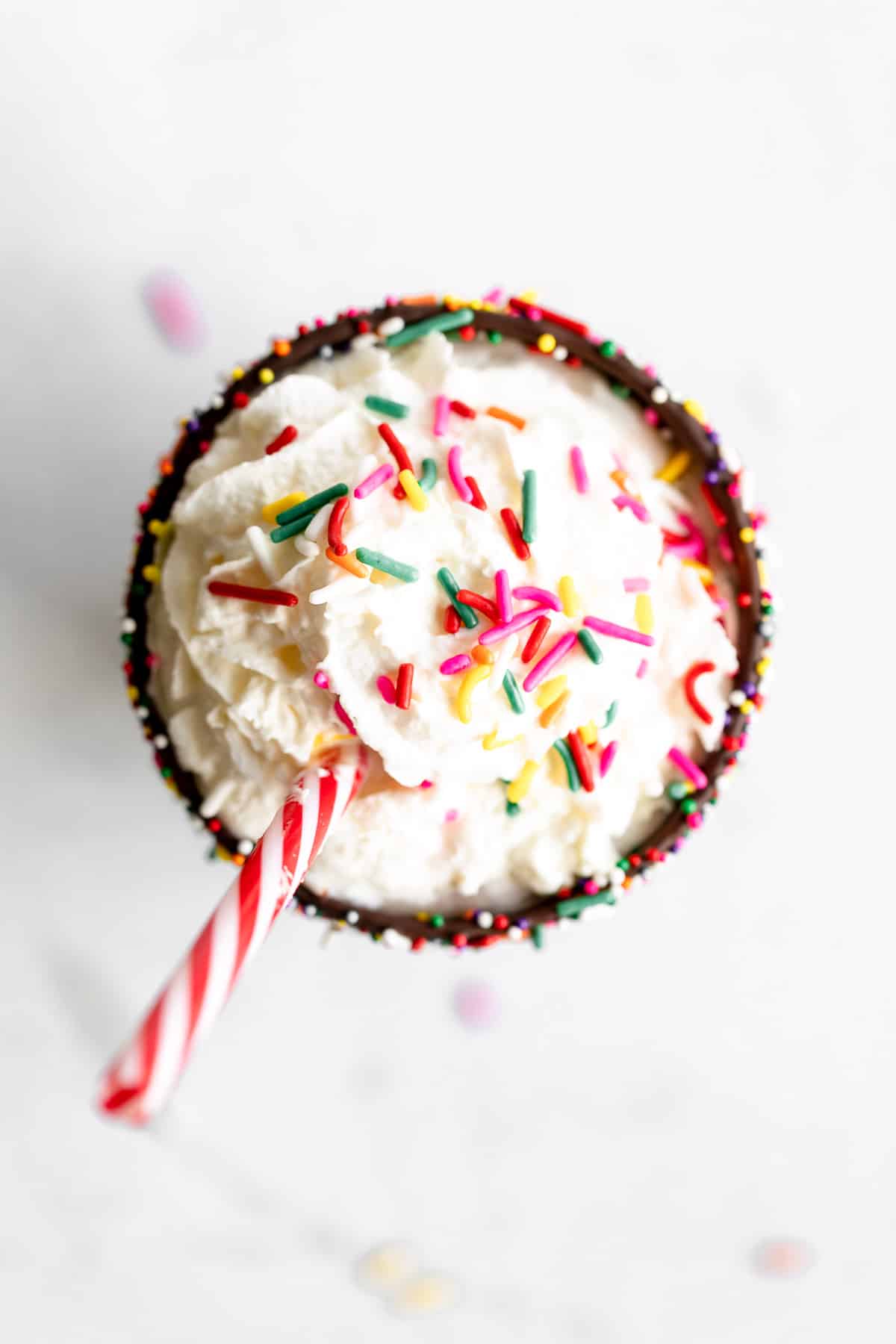 overhead shot of the glass with whipped cream and sprinkles