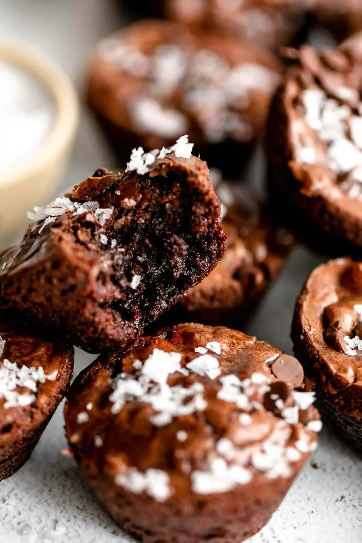 brownie bites with one bite taken out to show texture