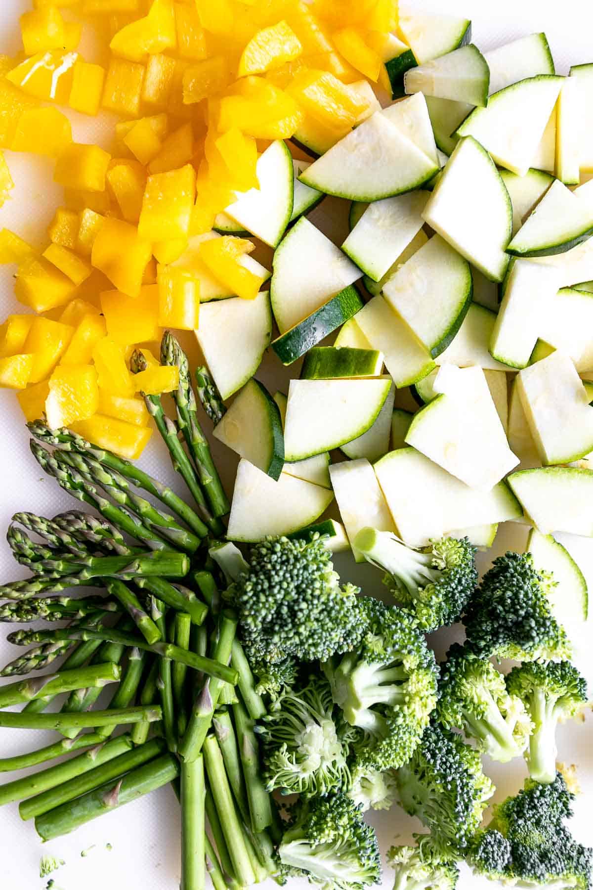 diced vegetables on a white cutting board