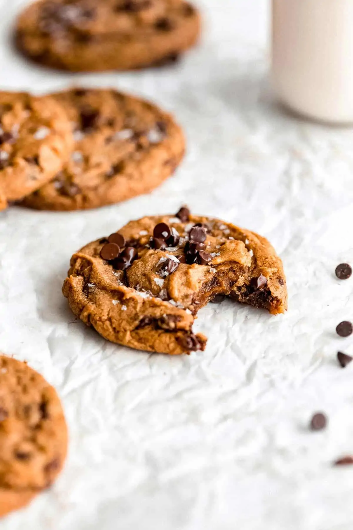 gluten free pumpkin cookies with chocolate chips on parchment paper