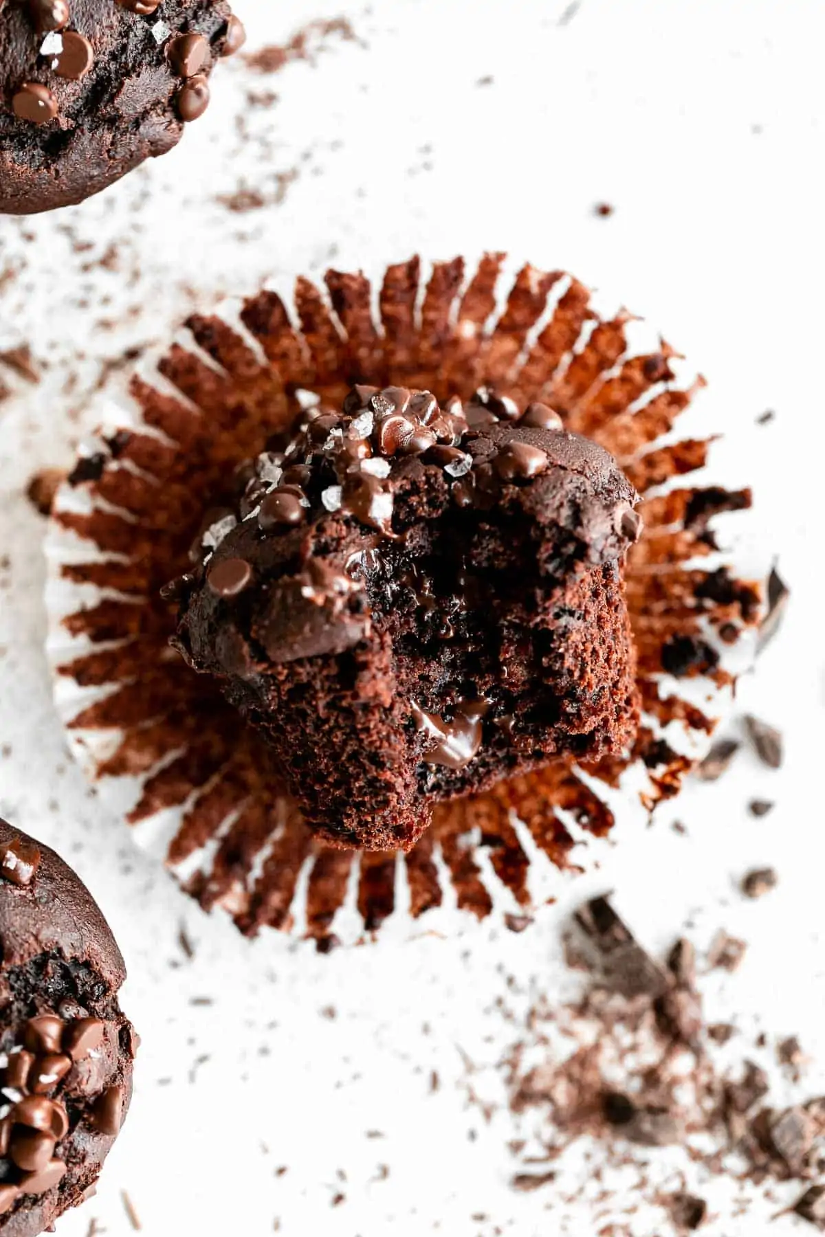 gluten free chocolate muffin with the wrapper pulled off