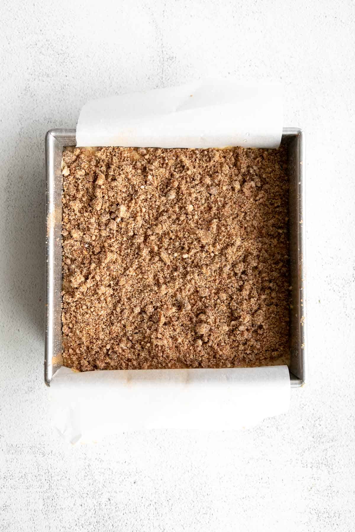 coffee cake in a baking pan before going in the oven