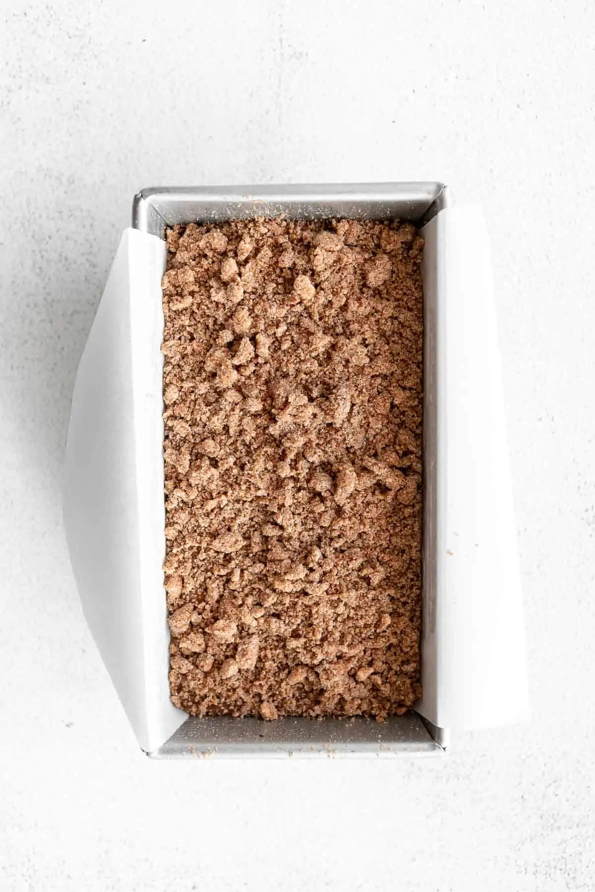 recipe in the baking dish with cinnamon streusel 