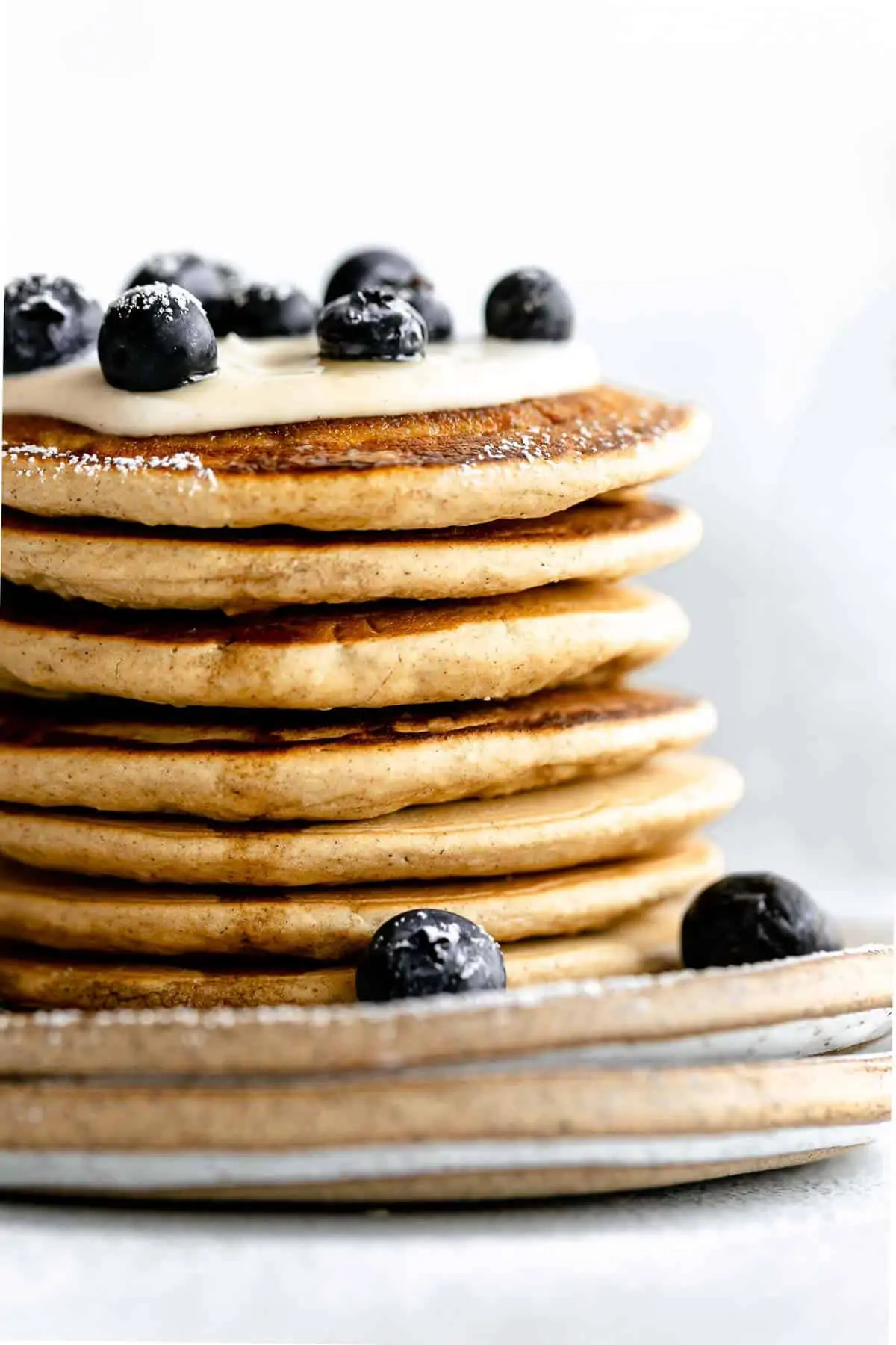 up close of gluten free oat flour pancakes with berries