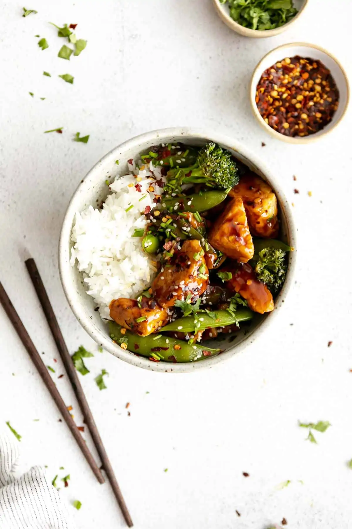 tempeh stir fry with broccoli and rice in a bowl