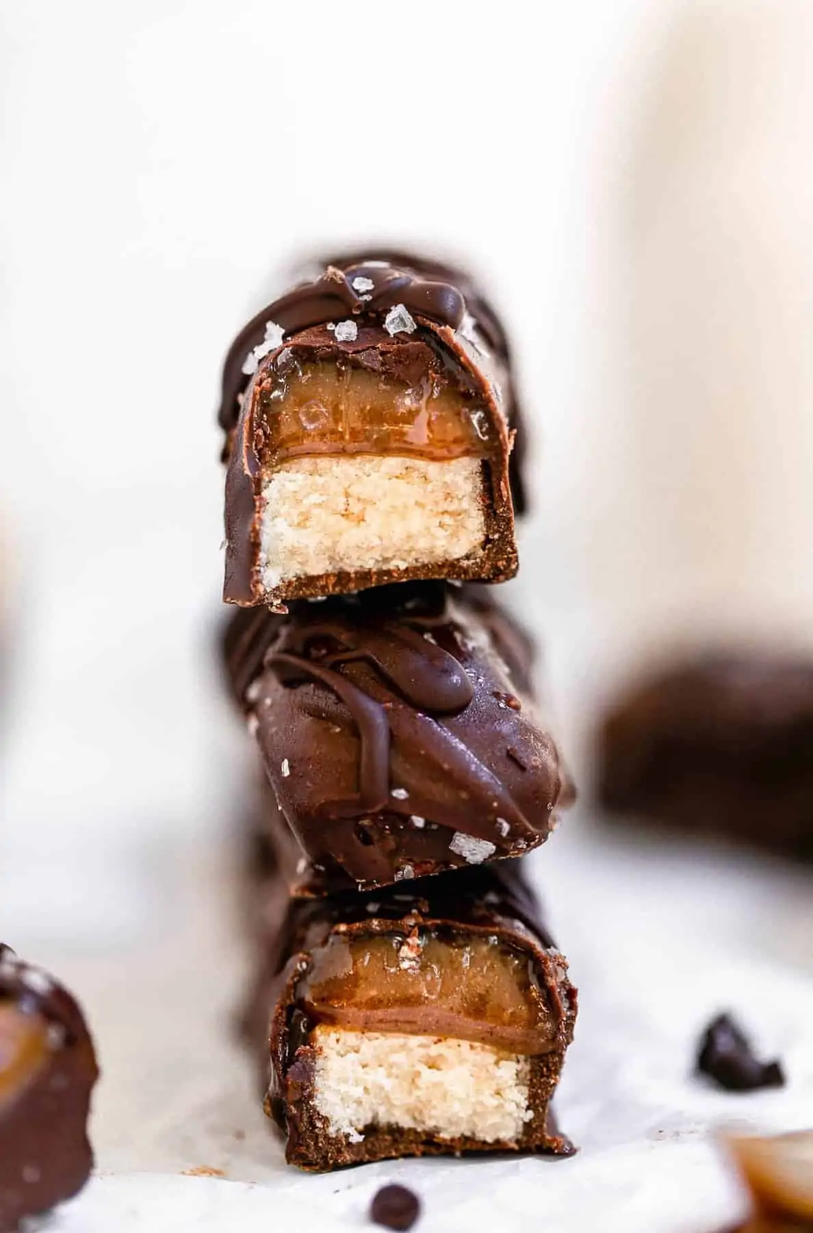 Three homemade twix bars stacked on each other.