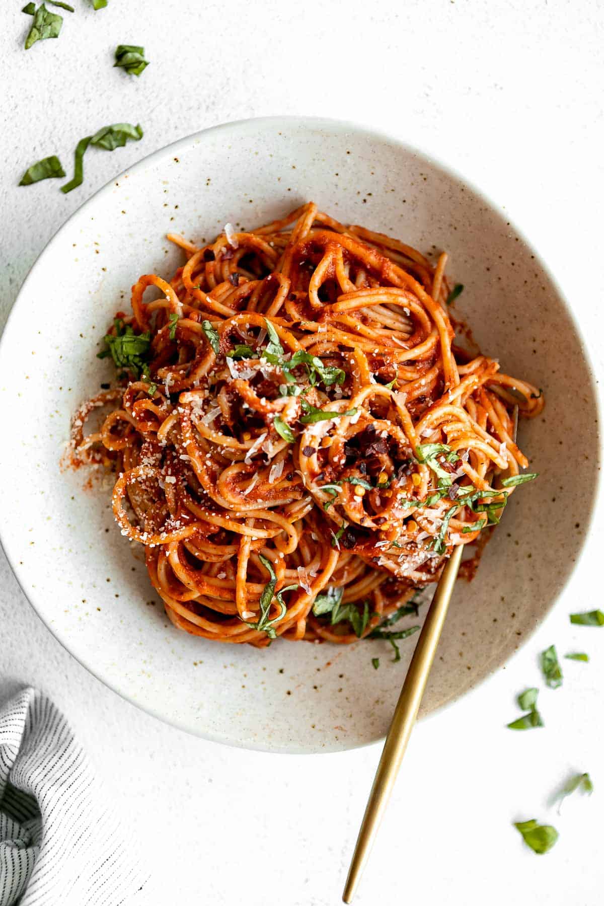 vegan spaghetti pomodoro sauce with basil on top
