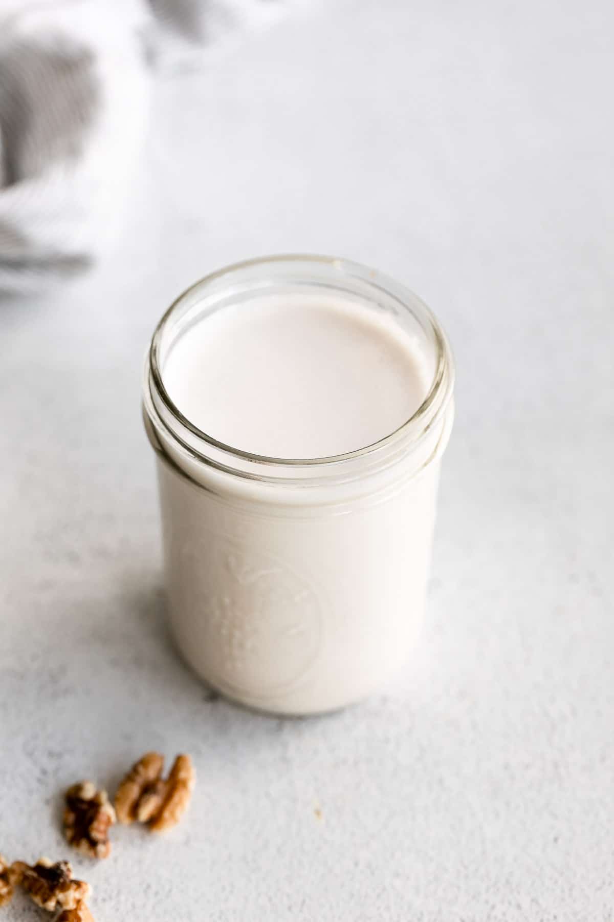 walnut milk in a masor jar 