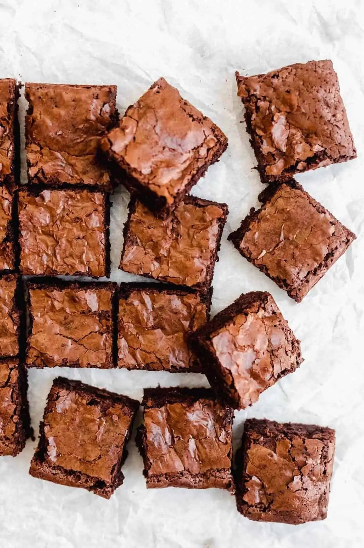 flourless Brownies cut into squares on parchment paper