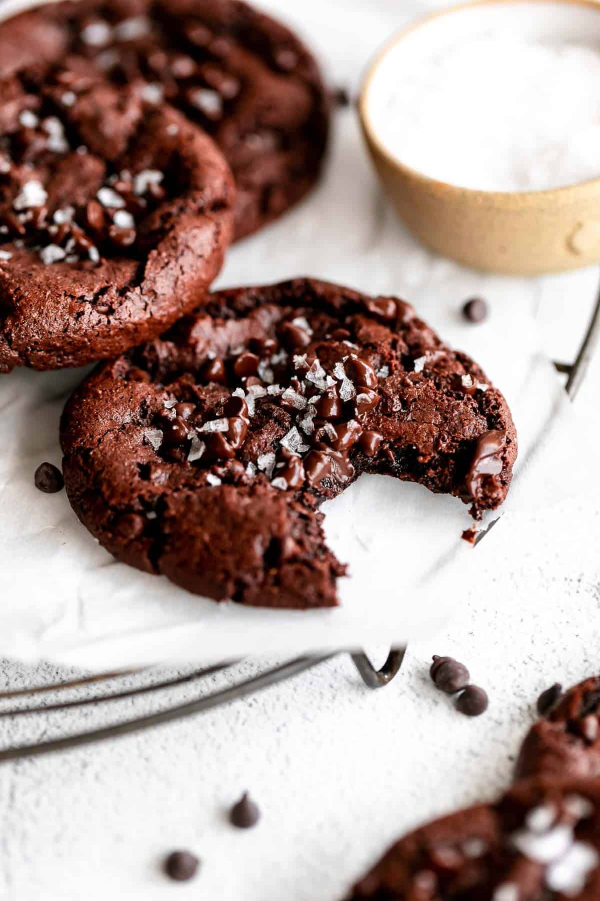 vegan double chocolate chip cookies with a bite taken out
