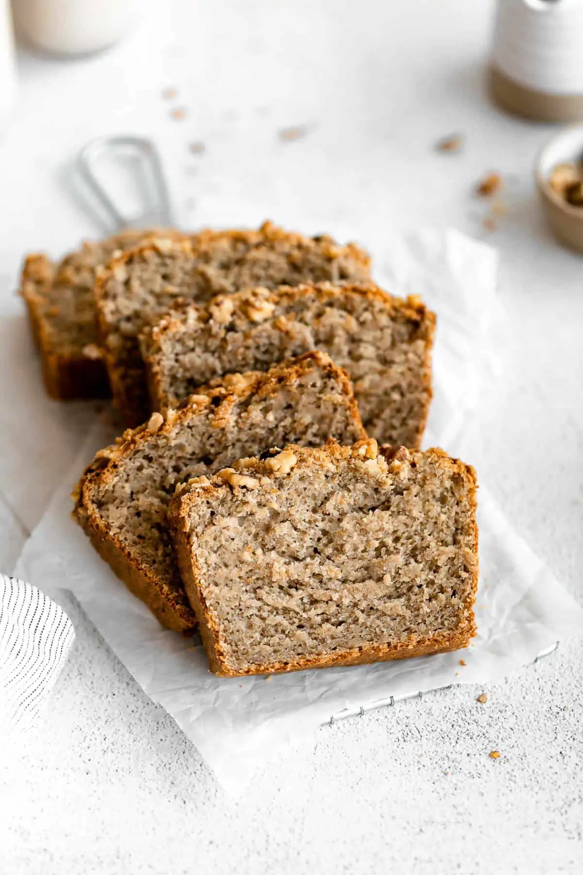 five slices of gluten free banana bread with walnuts