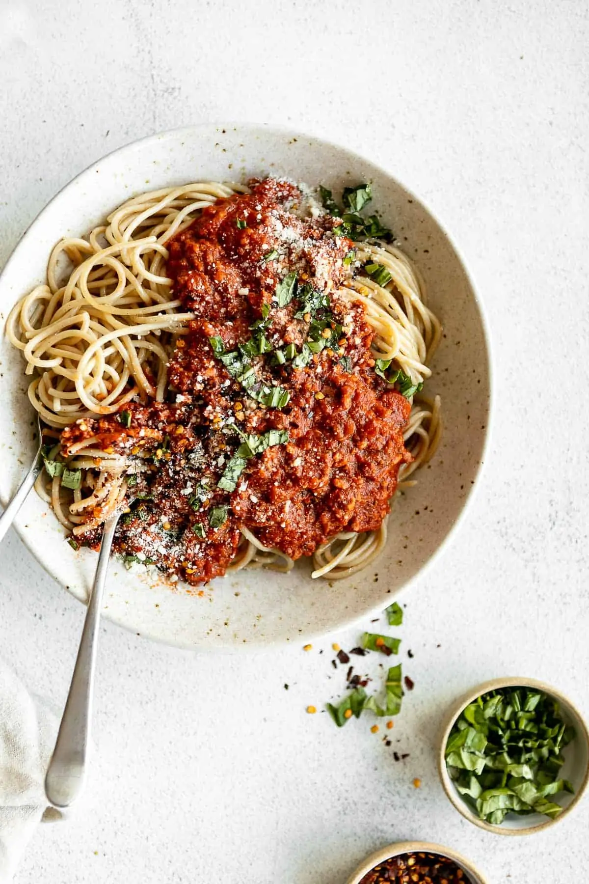 chicken bolognese with spaghetti in a bowl