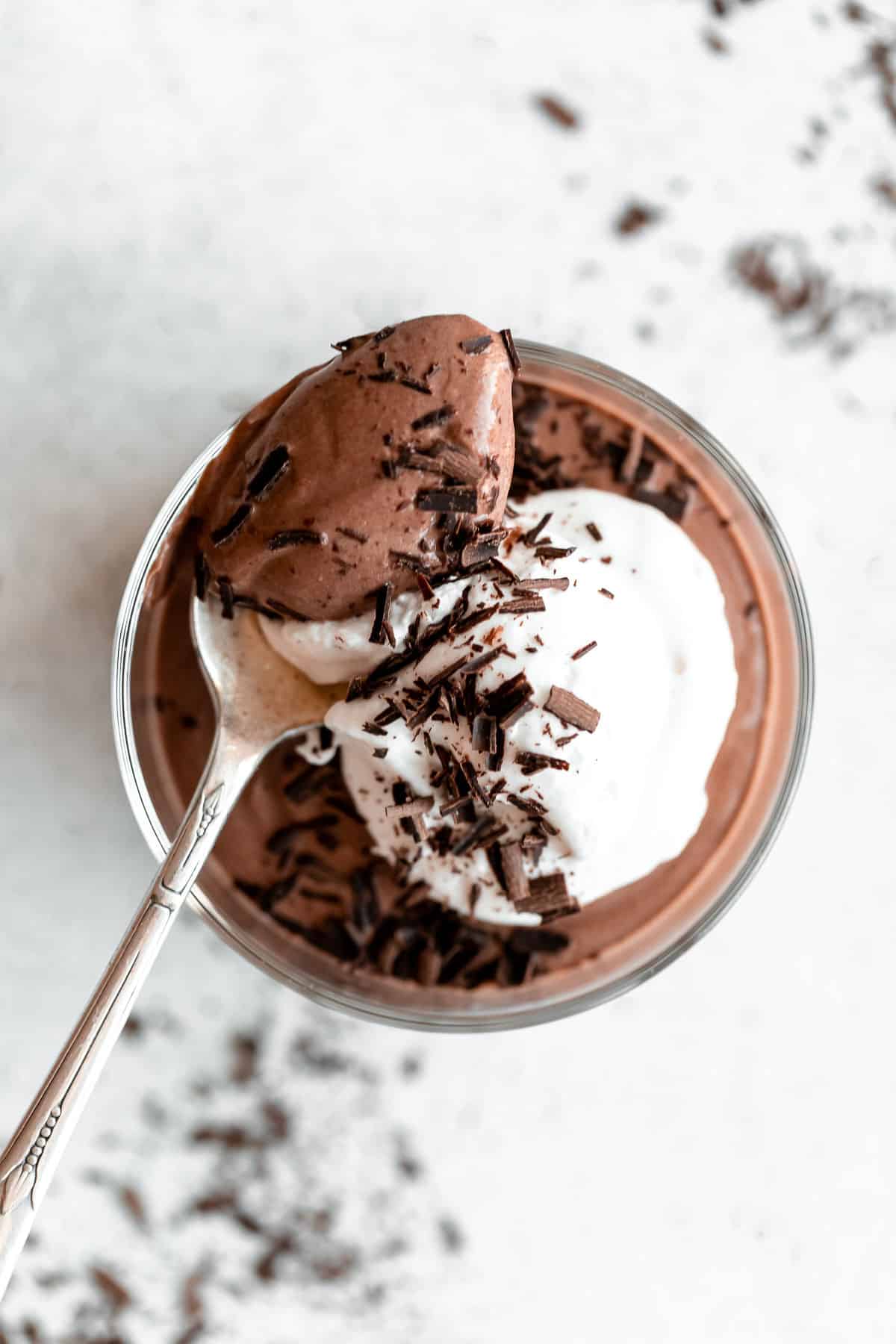 mousse in a container with chocolate shavings on top