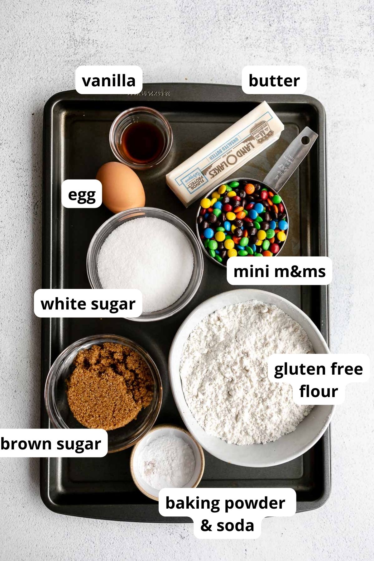labeled ingredients for the cookies in bowls