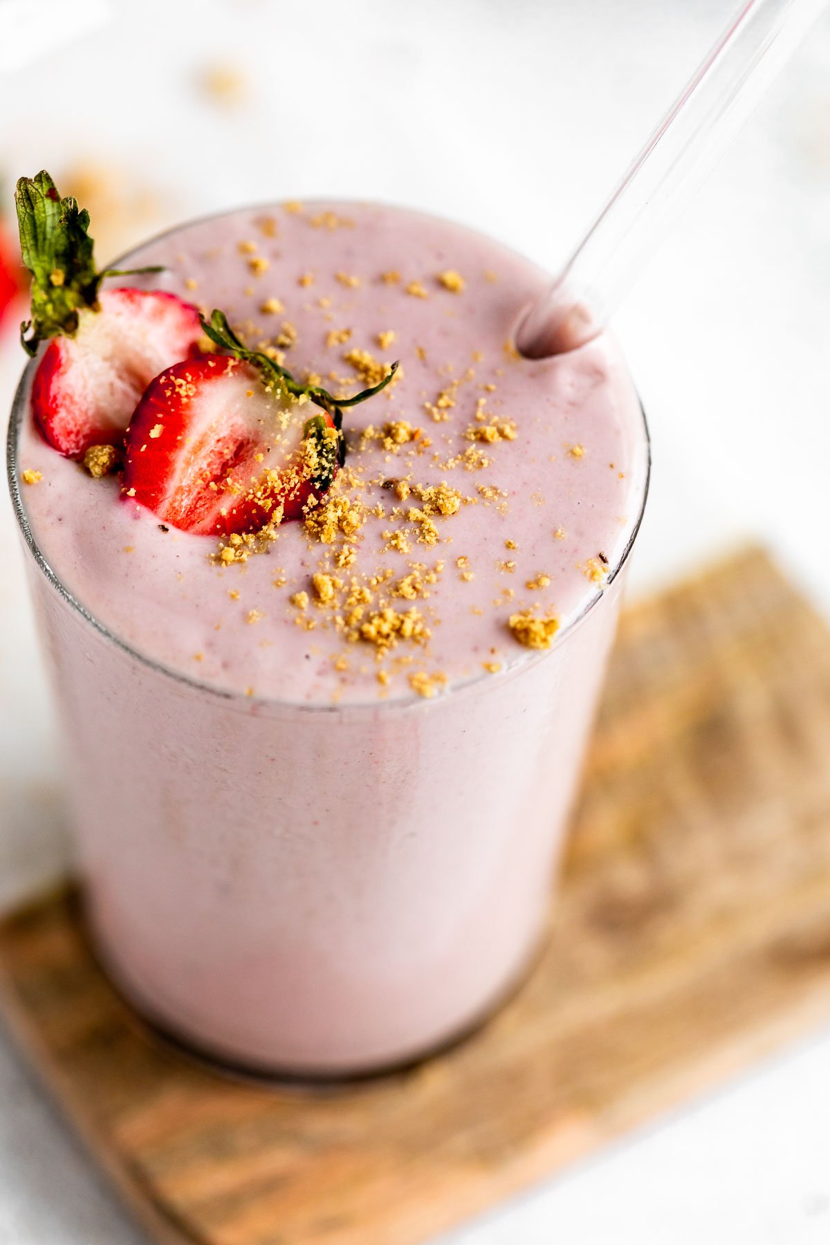 banana protein shake in a cup with berries