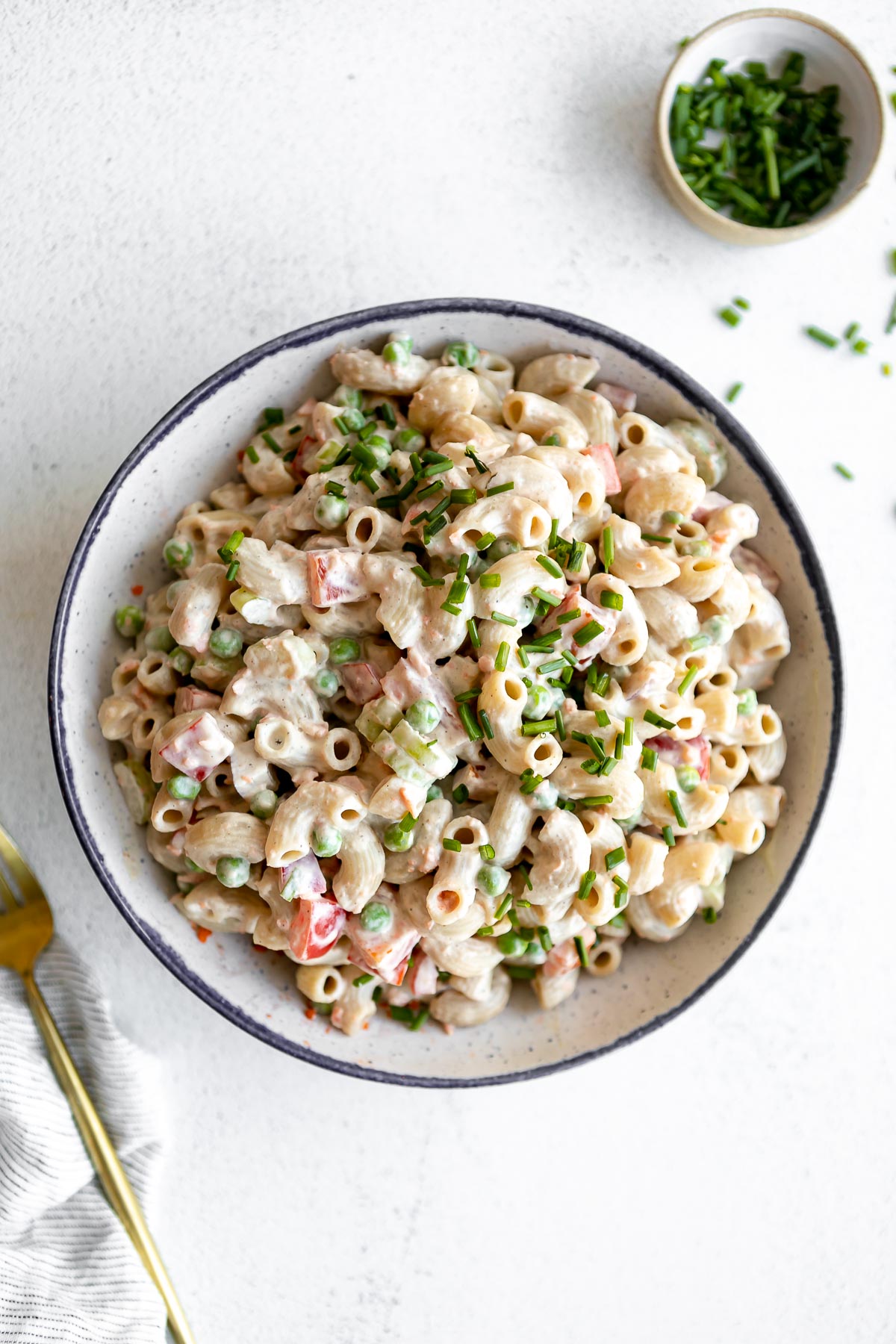 vegan macaroni salad with no mayo in a bowl with chives