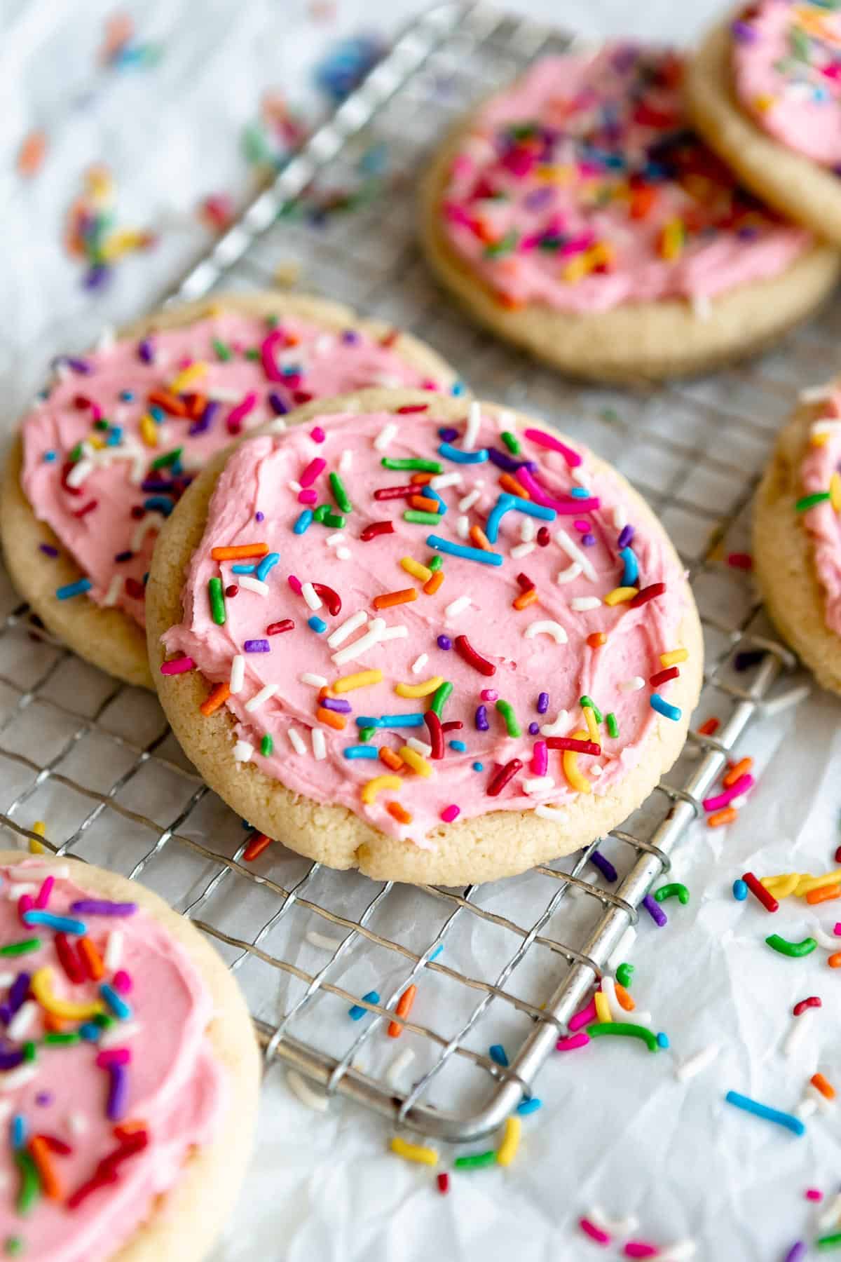 almond flour sugar cookies with sprinkles on a wire rack