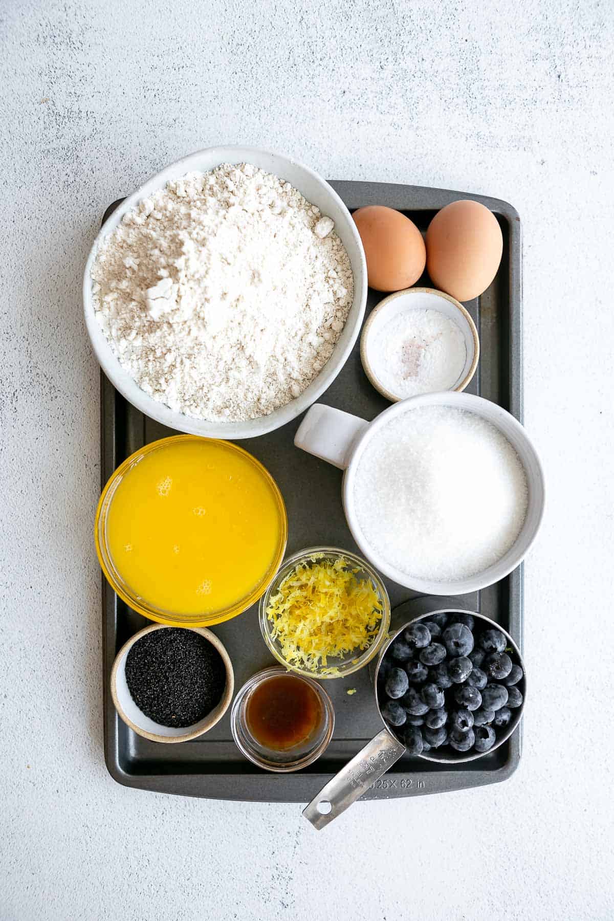 ingredients for the recipe in bowls on a white backdrop