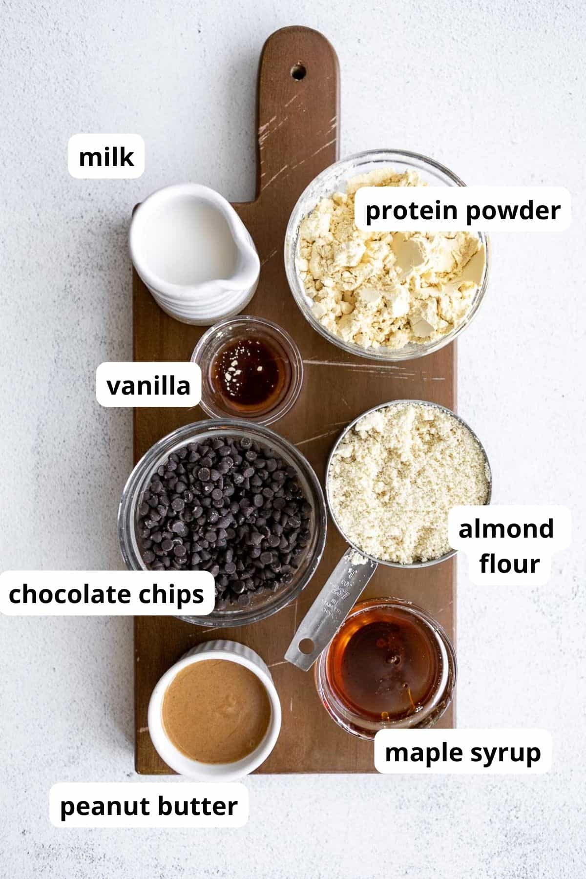 ingredients for the recipe in bowls on a wood board