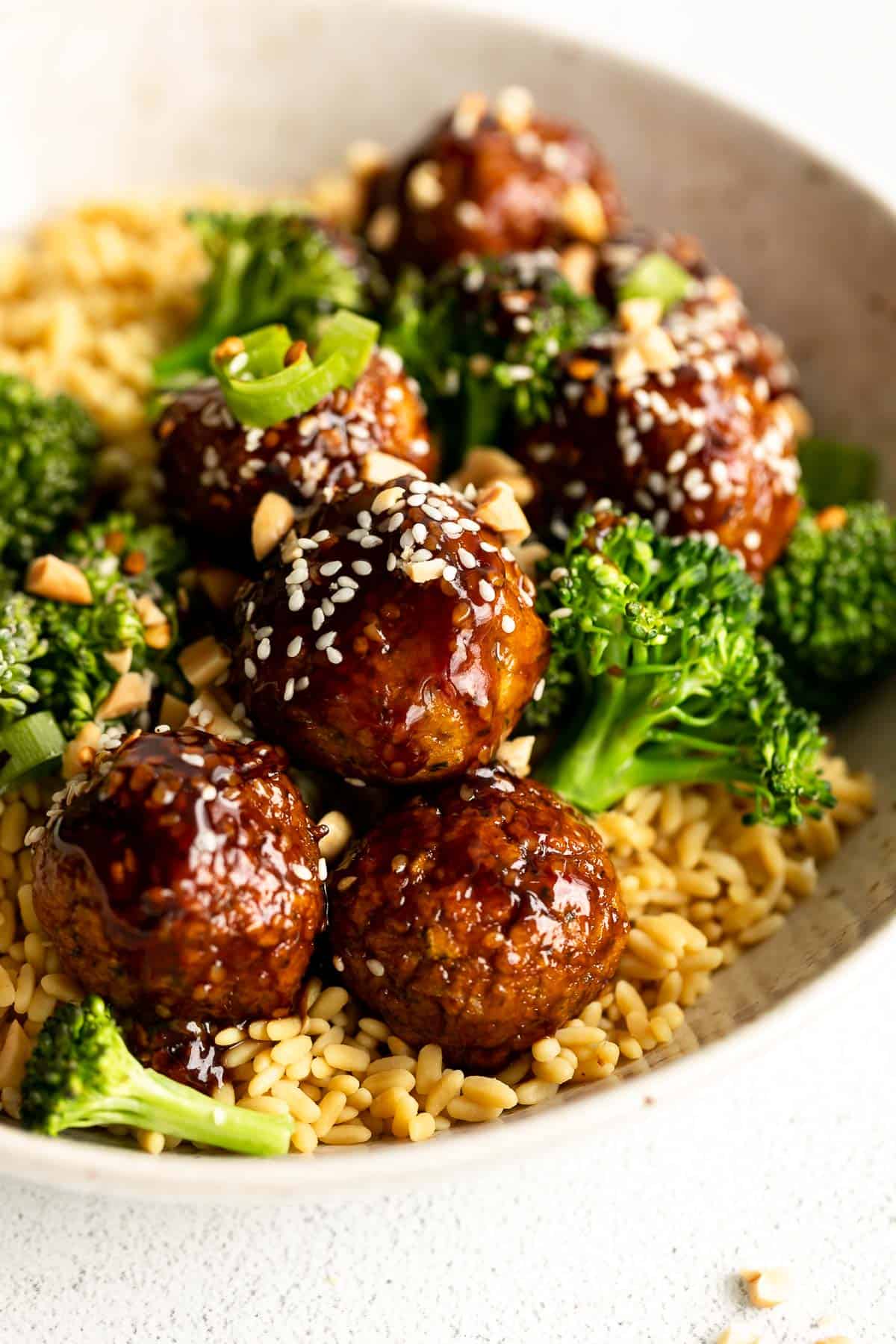 vegetarian chickpea meatballs in a bowl with broccoli and rice