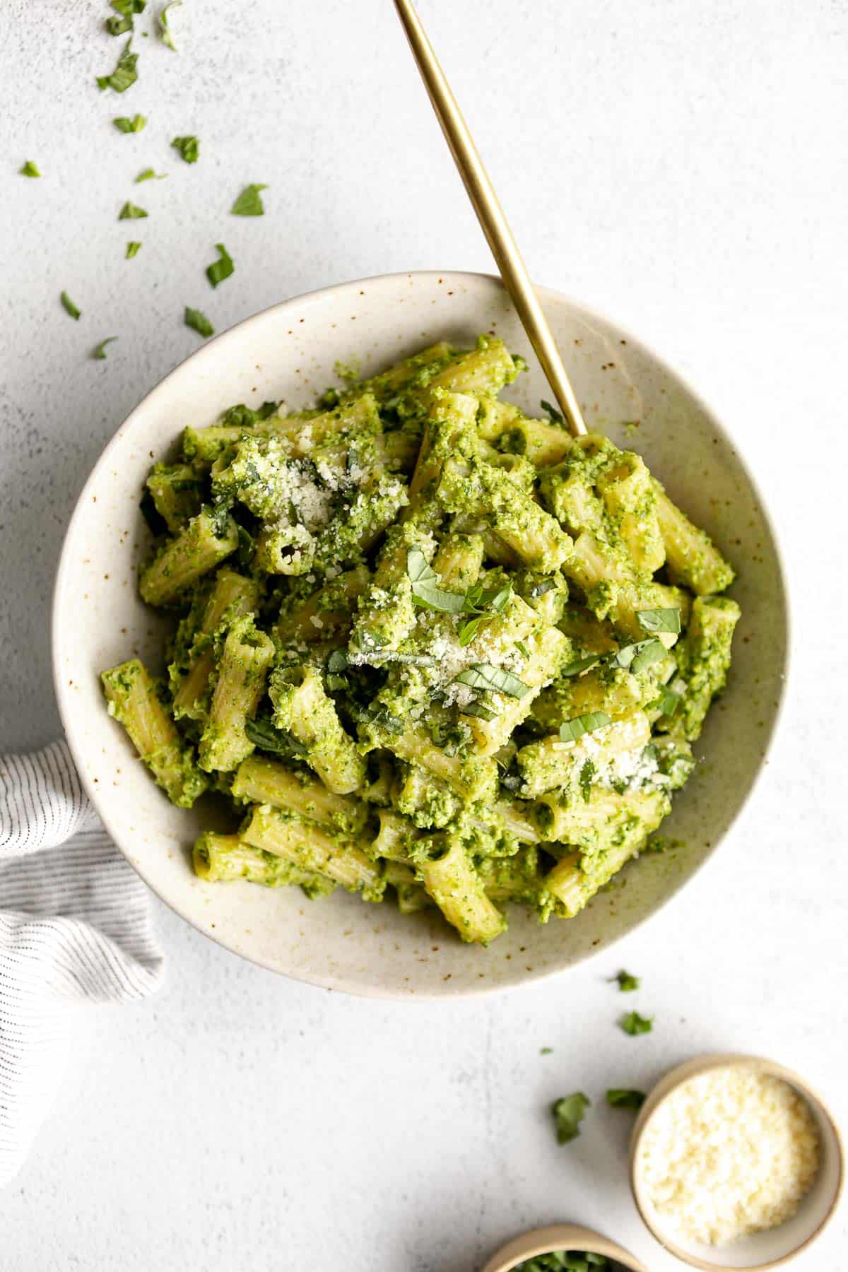 broccoli pesto pasta with rigatoni in a bowl with parmesan