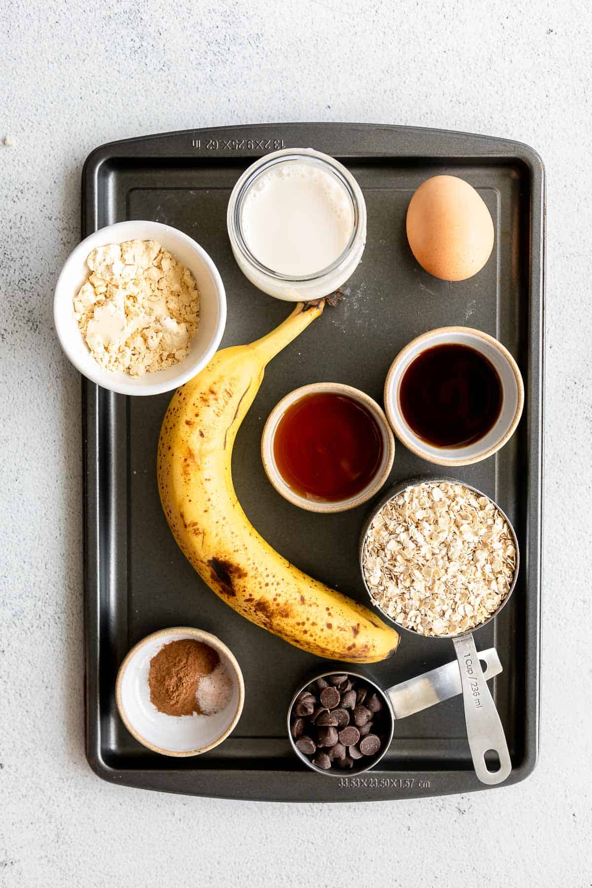 ingredients for the baked oatmeal on a baking sheet