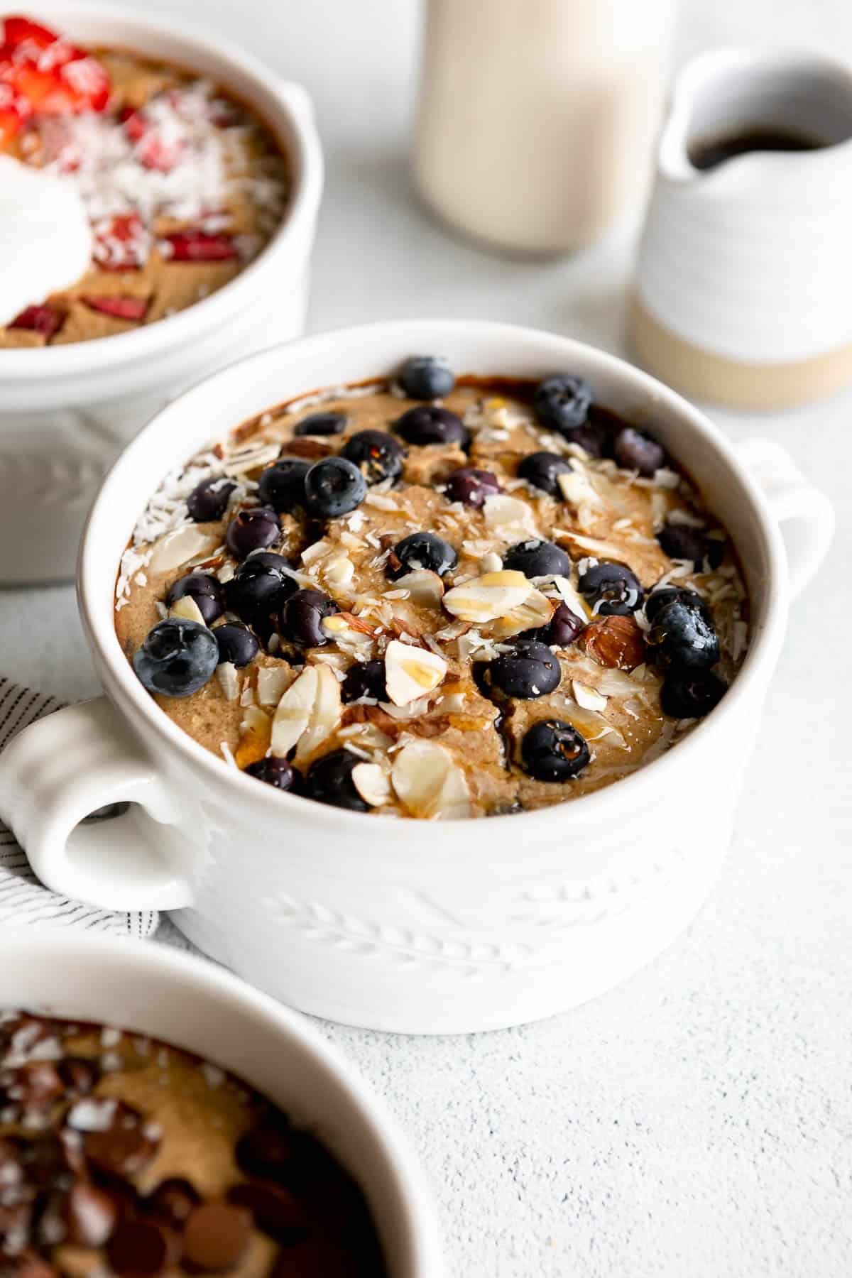 three flavors of the baked protein oatmeal with blueberries