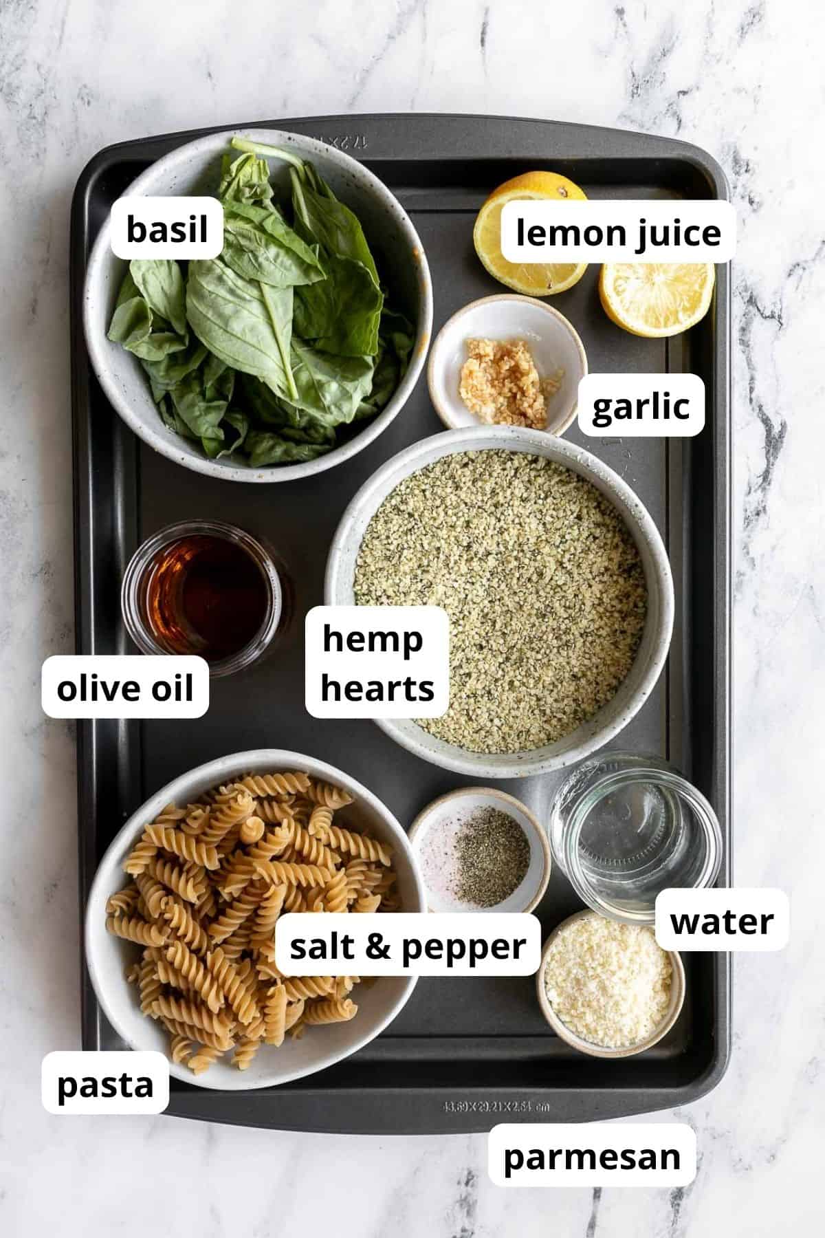 ingredients for the recipe in bowls with labels