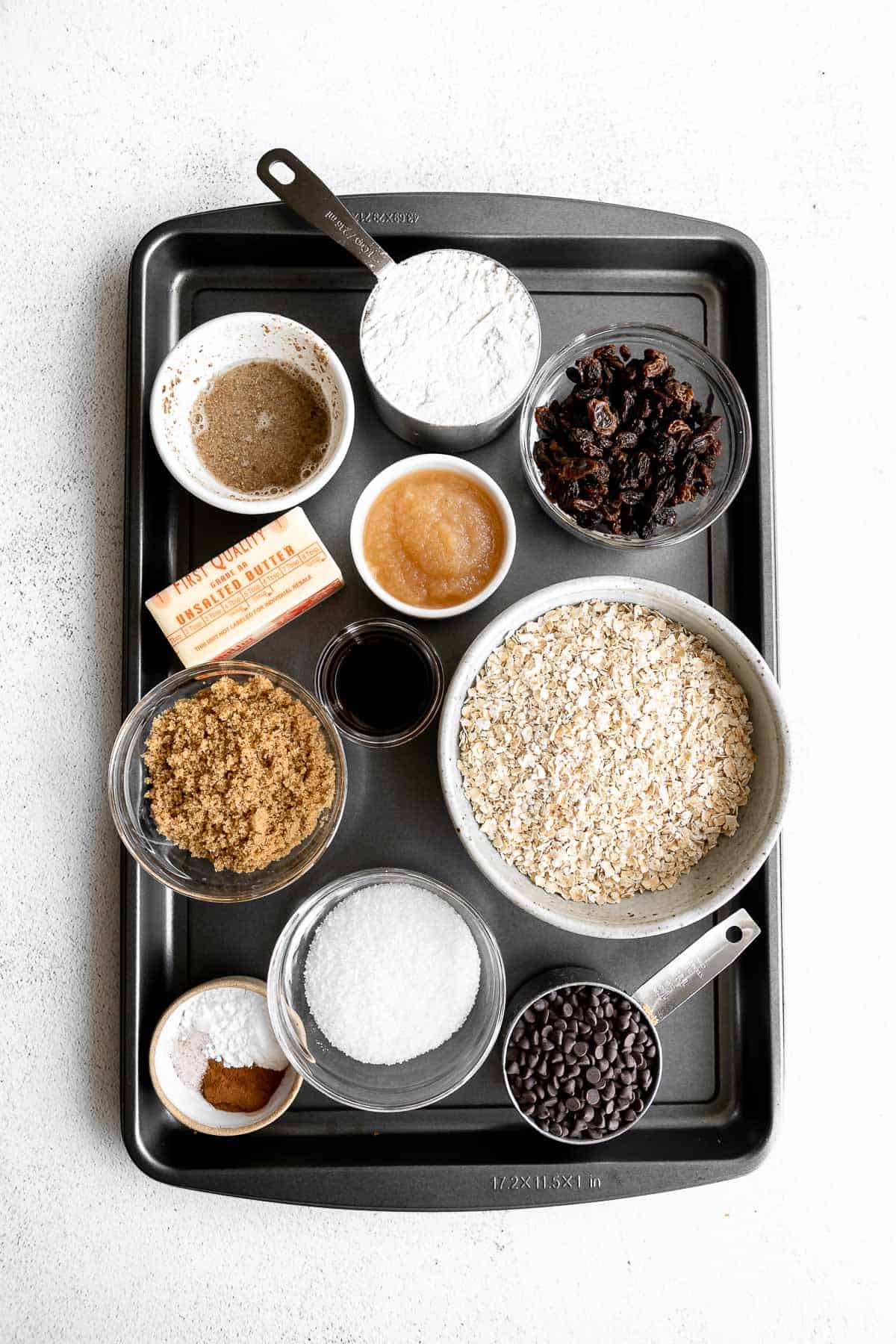 ingredients in bowls on a baking sheet