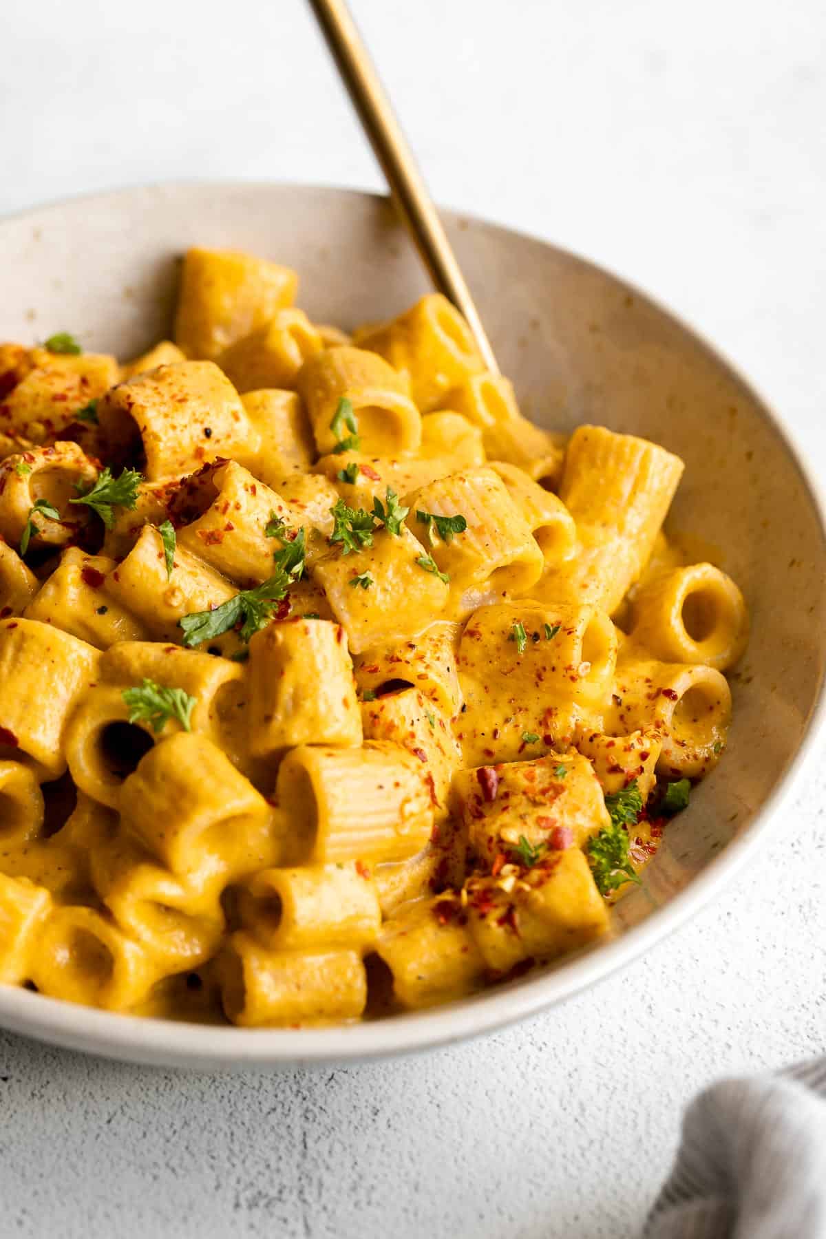 vegan pumpkin pasta in a bowl with rigatoni