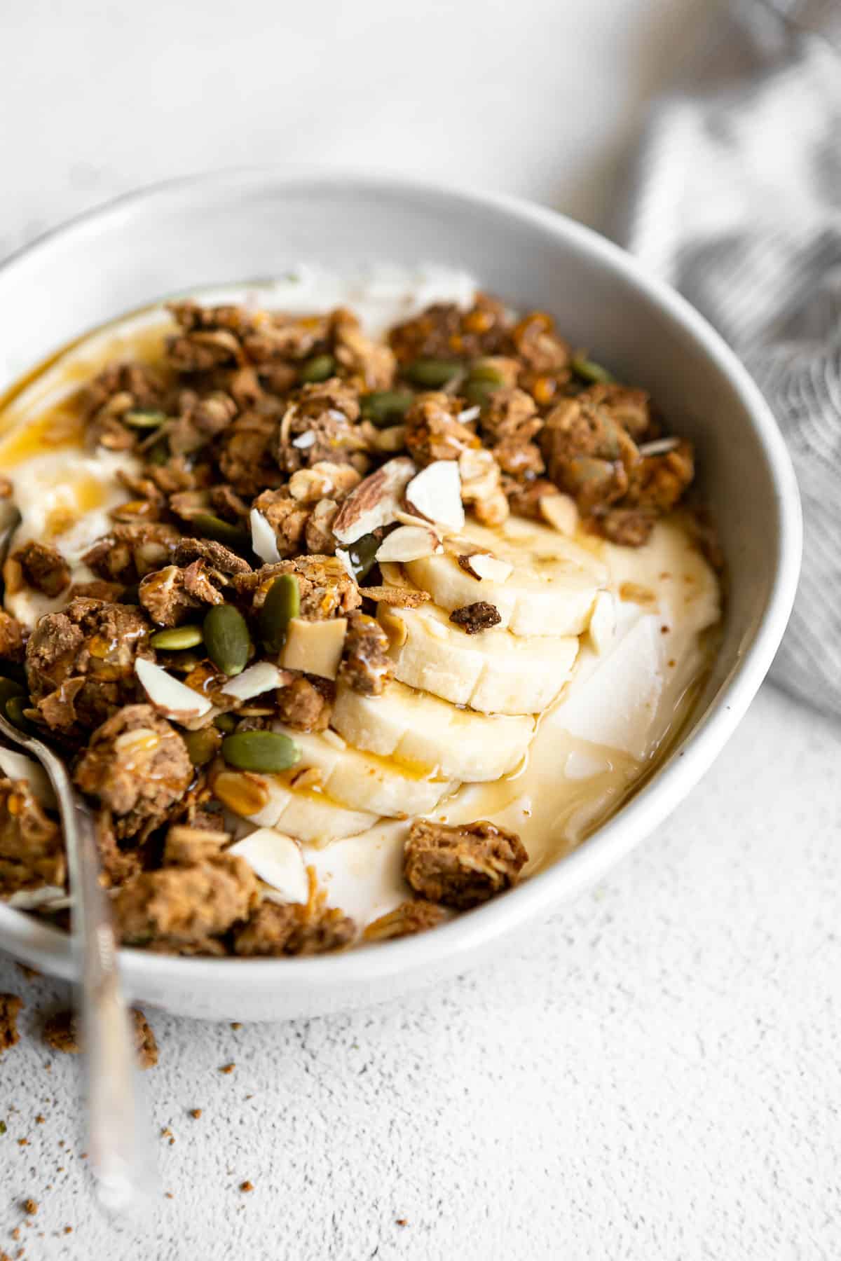 peanut butter protein granola with yogurt and banana