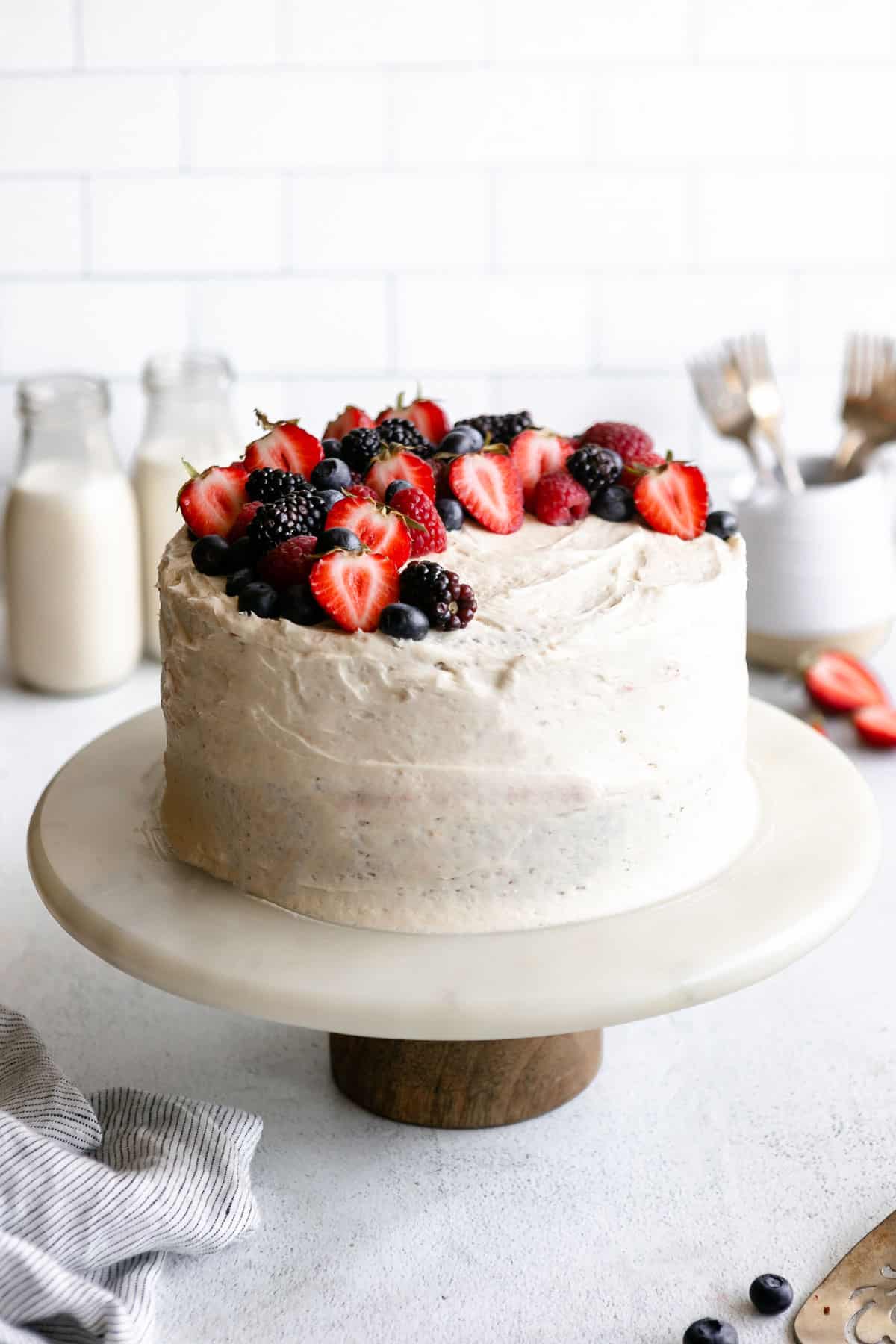 almond flour vanilla cake with berries on top 