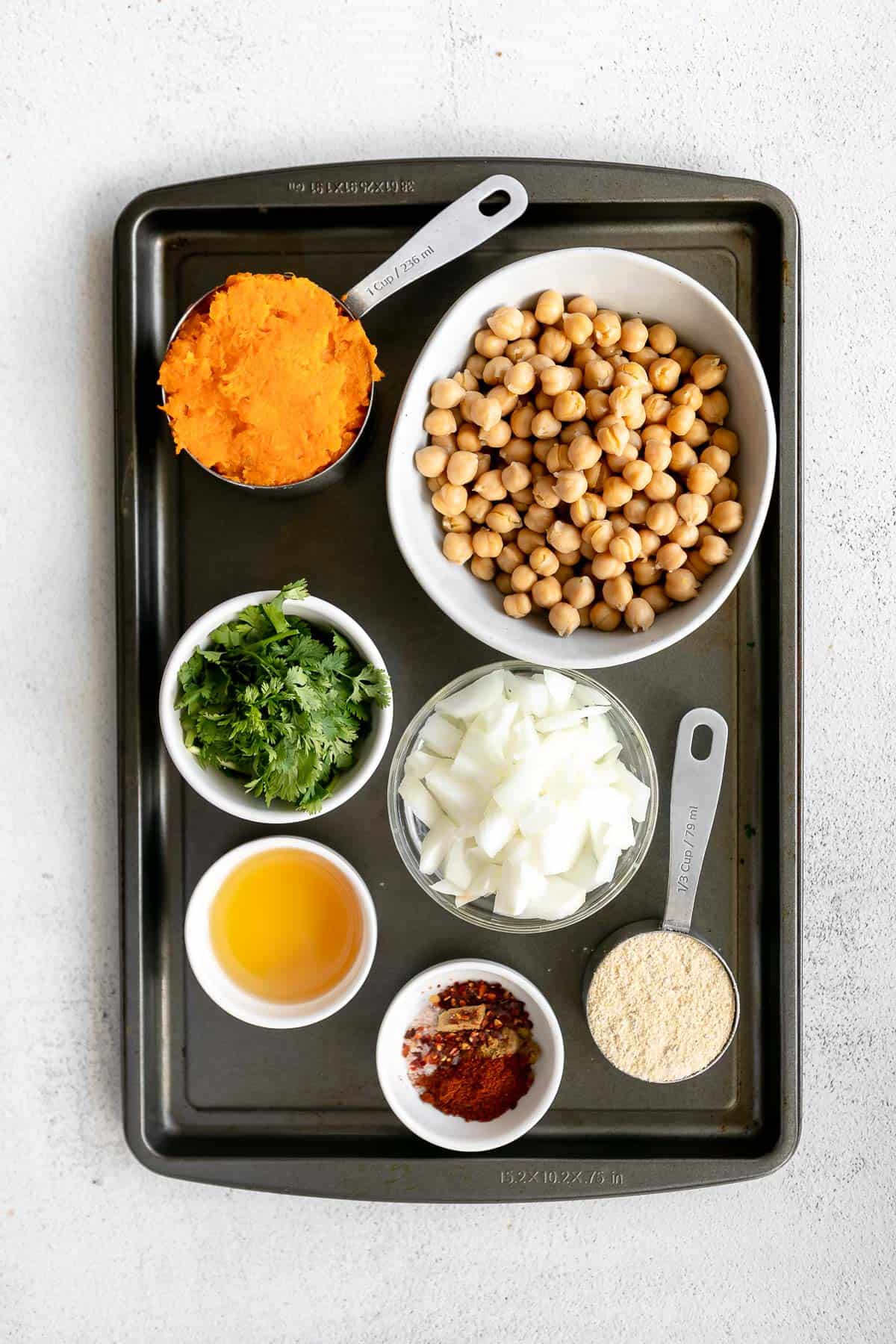 ingredients for the bowls on a baking sheet