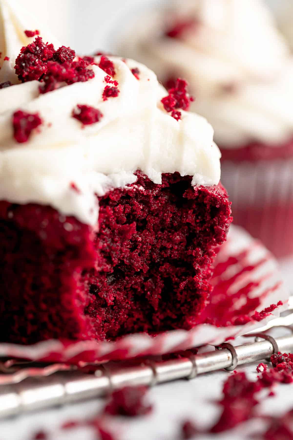 vegan red velvet cupcakes with a bite taken out