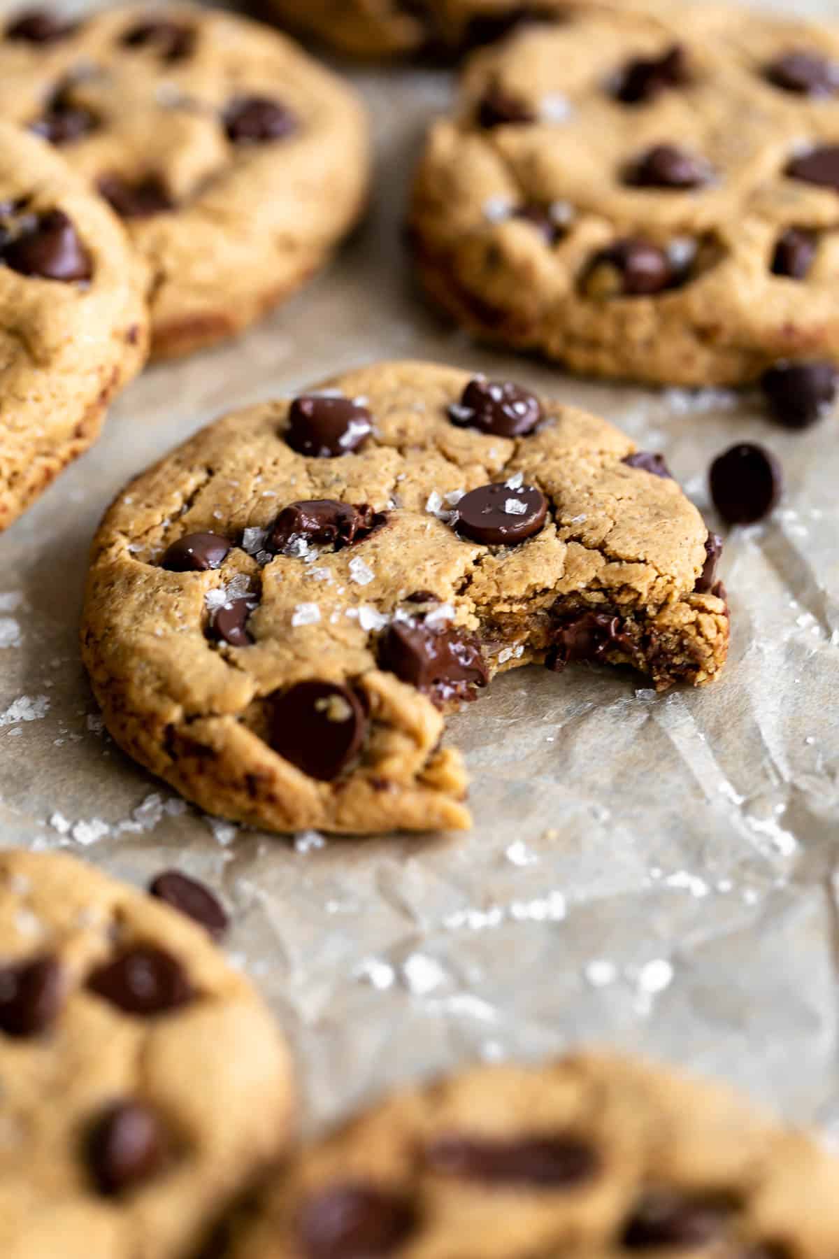 high protein cookies with melted chocolate on parchment paper