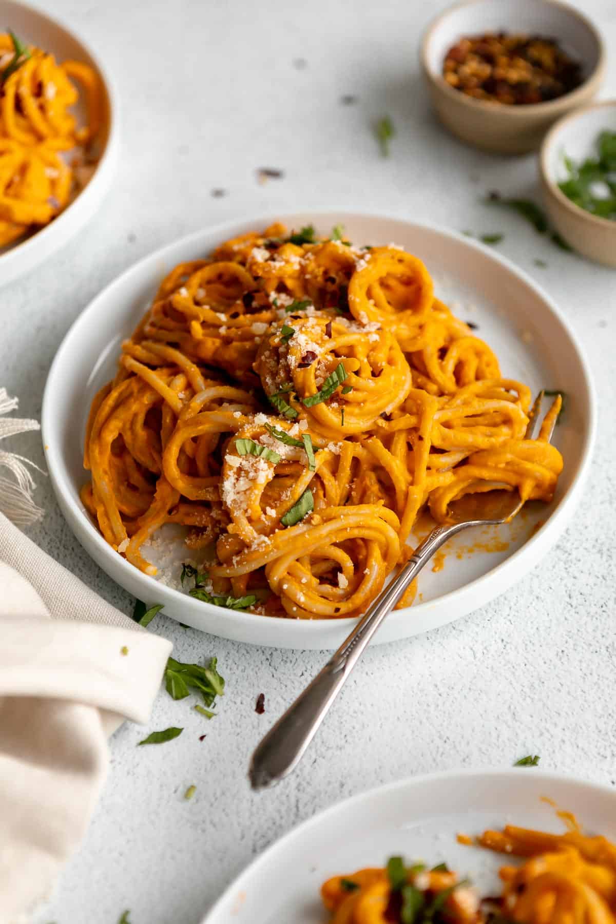 carrot pasta sauce with spaghetti on a plate