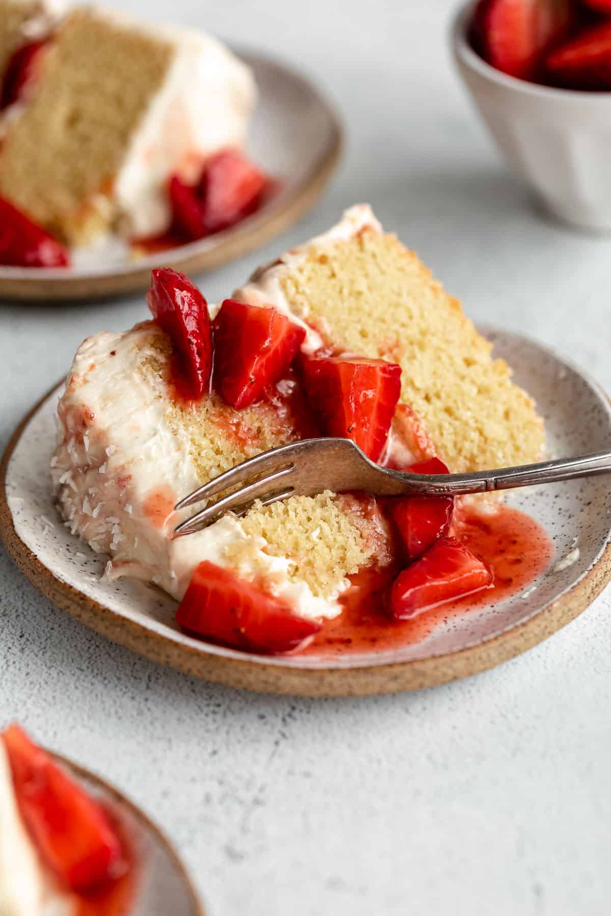 gluten free strawberry shortcake on a plate with a fork