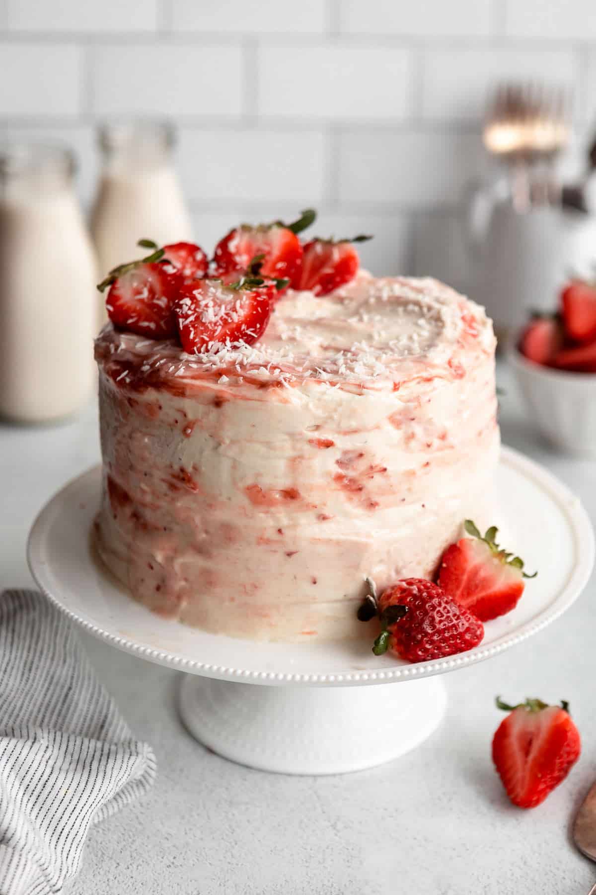 gluten free strawberry shortcake cake with fresh berries on the side