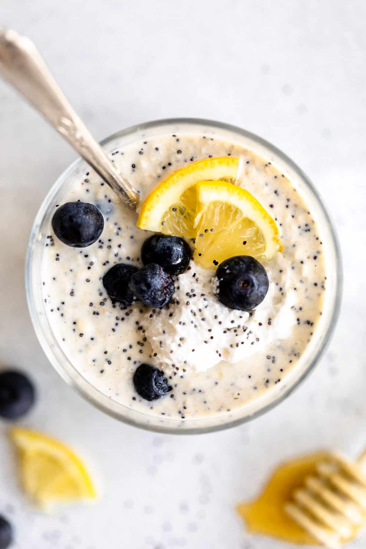 vegan overnight oats in a bowl with blueberries and yogurt