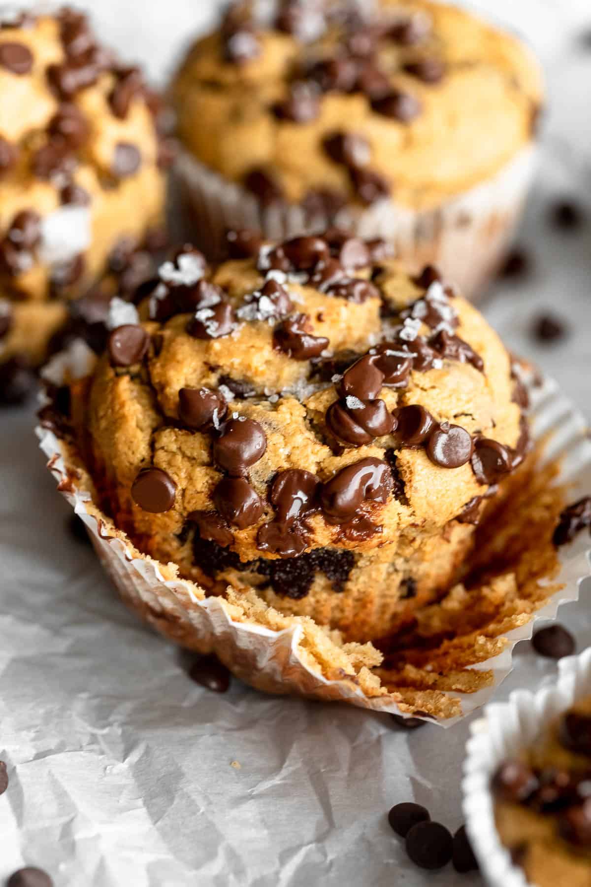 banana protein muffins with chocolate chips on top