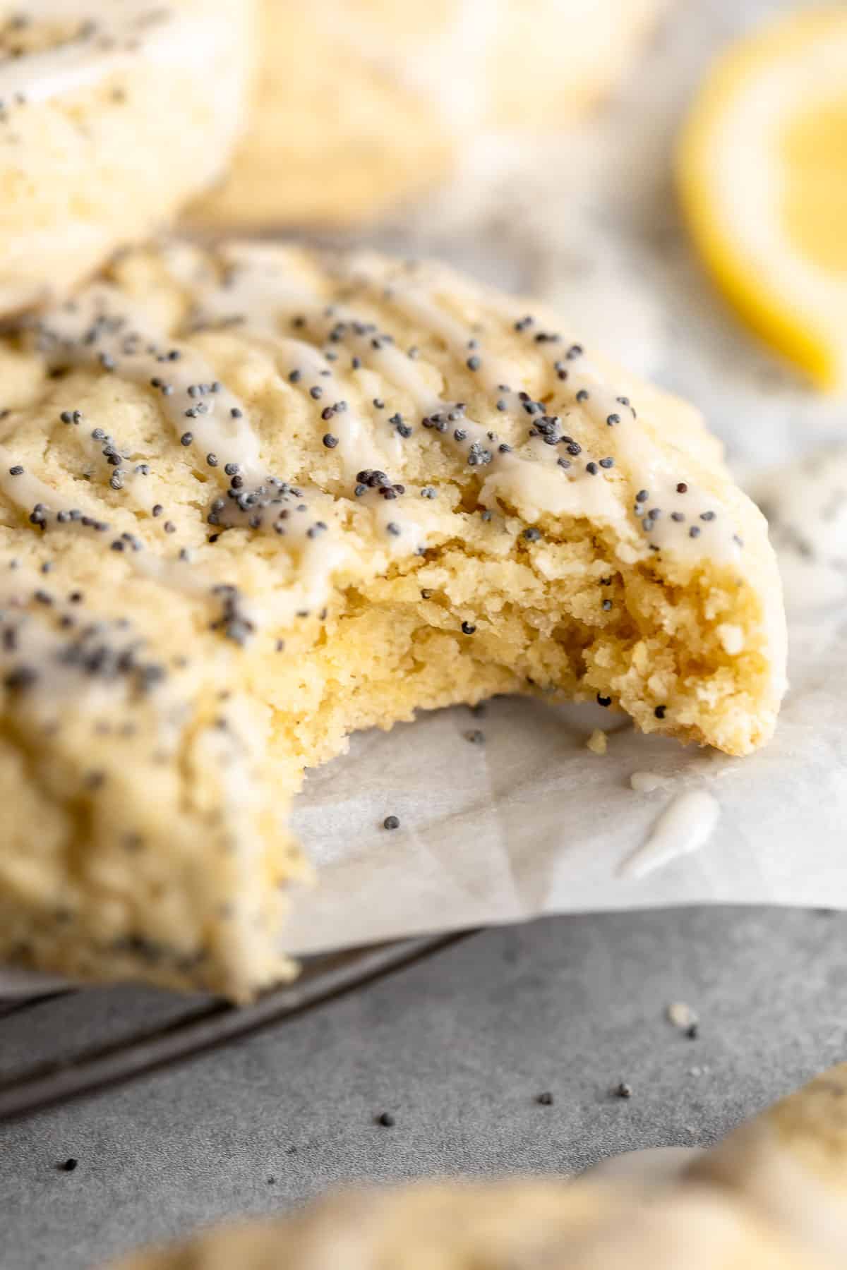 gluten free lemon poppy seed cookies with a bite taken out