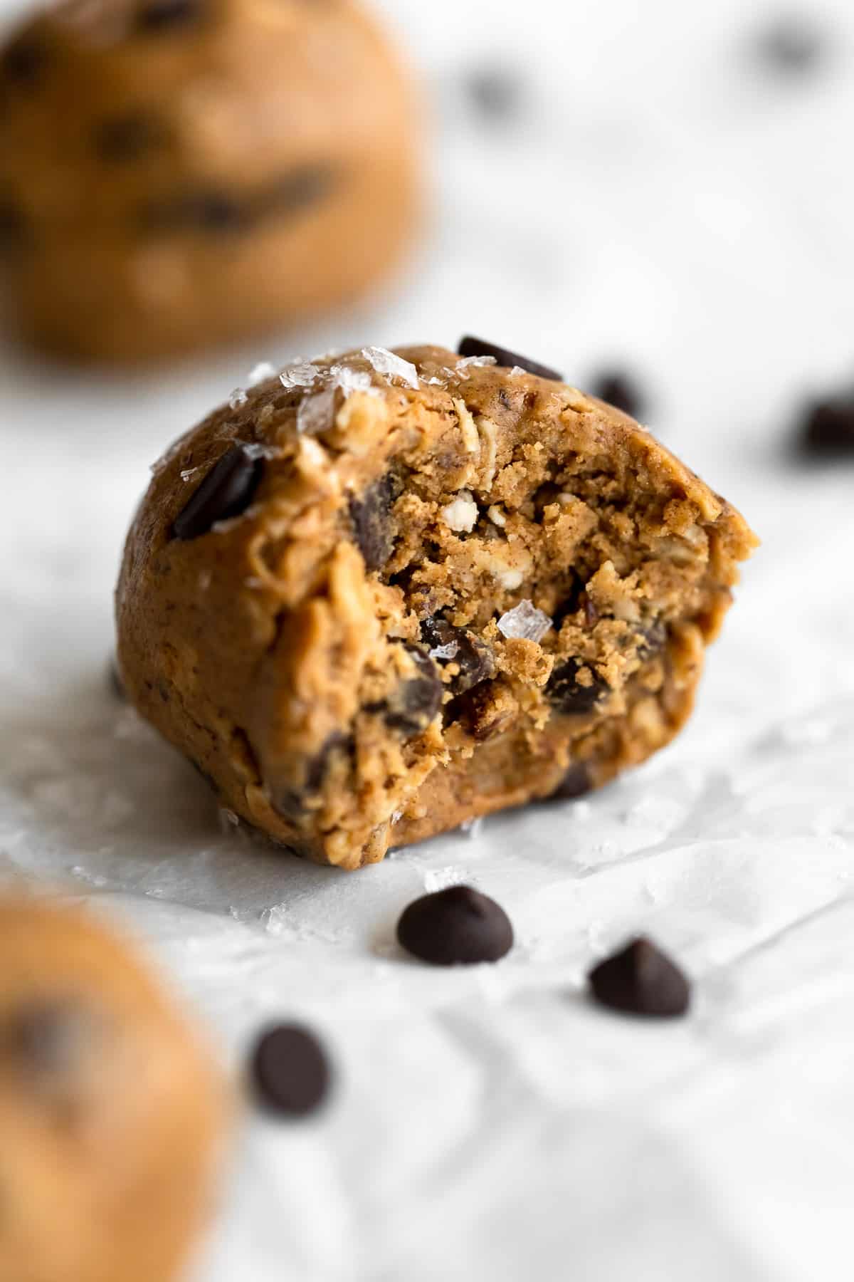 peanut butter protein balls with a bite taken out
