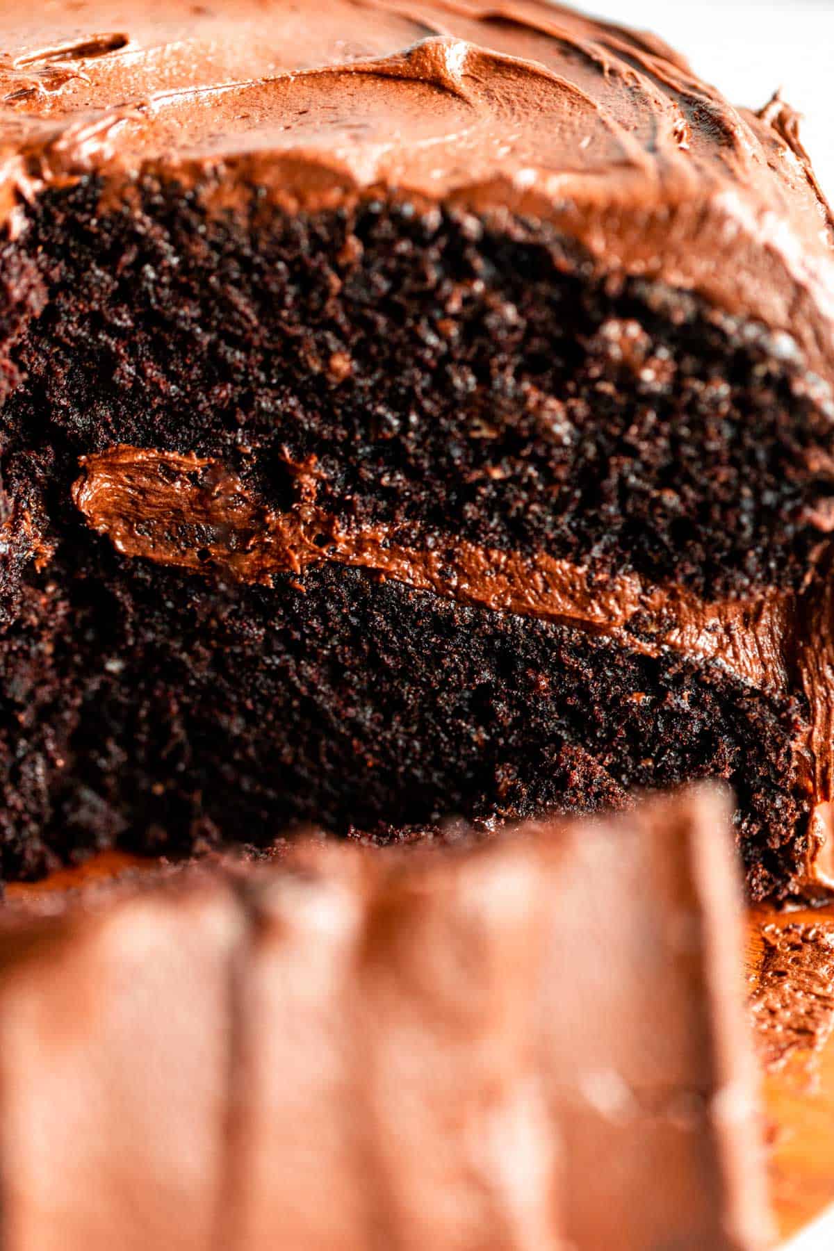 up close of the gluten free chocolate cake with chocolate buttercream frosting